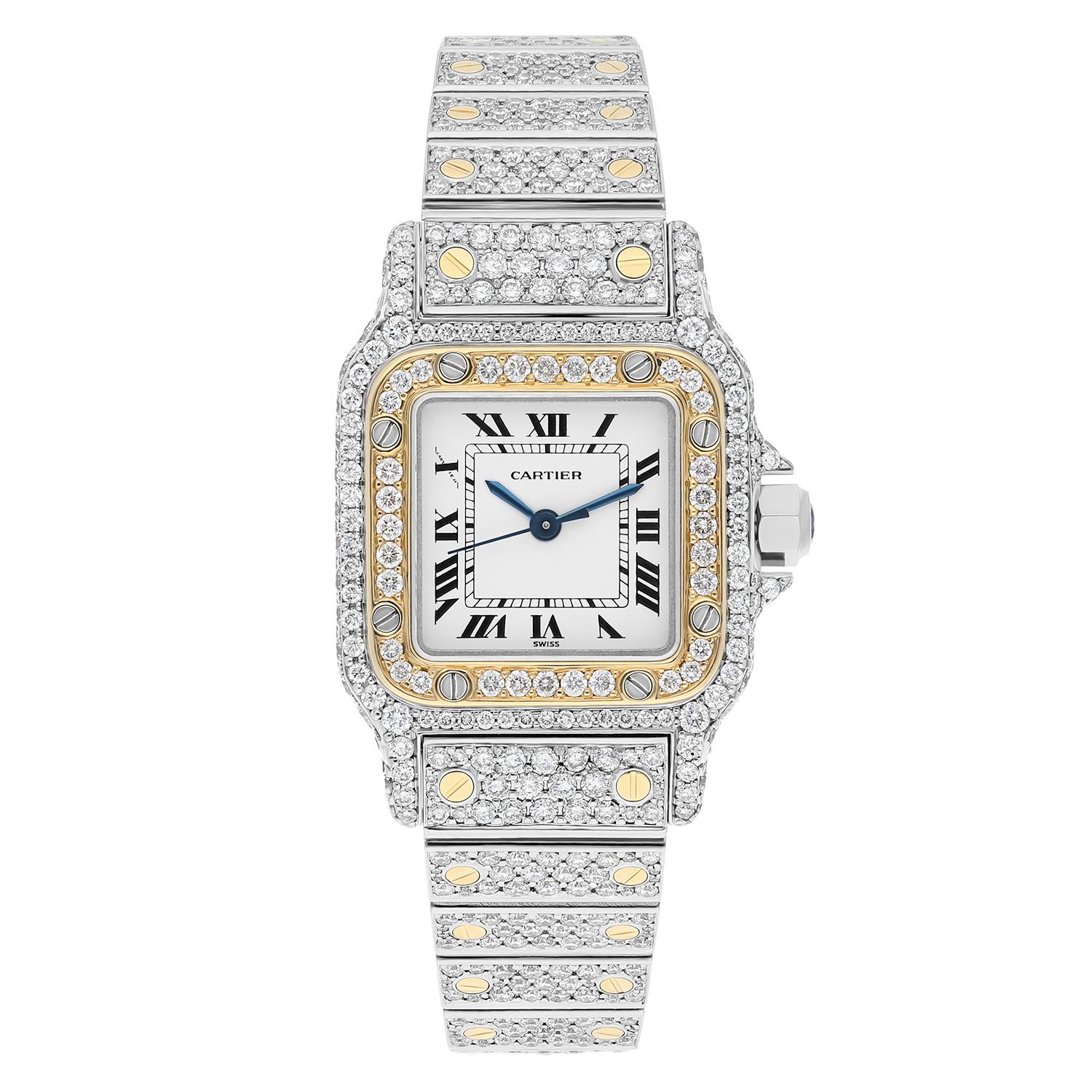 Brand: Cartier
Series: Santos 
Case Diameter: 24 mm
Bracelet: 18k yellow gold & stainless steel
Bezel: Custom diamond set
Dial: Off-white Dial
The sale includes a Cartier watch box and an appraisal certificate which states the watch's