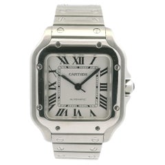 Reloj Cartier Santos de acero inoxidable con esfera romana en color blanco roto, modelo mediano