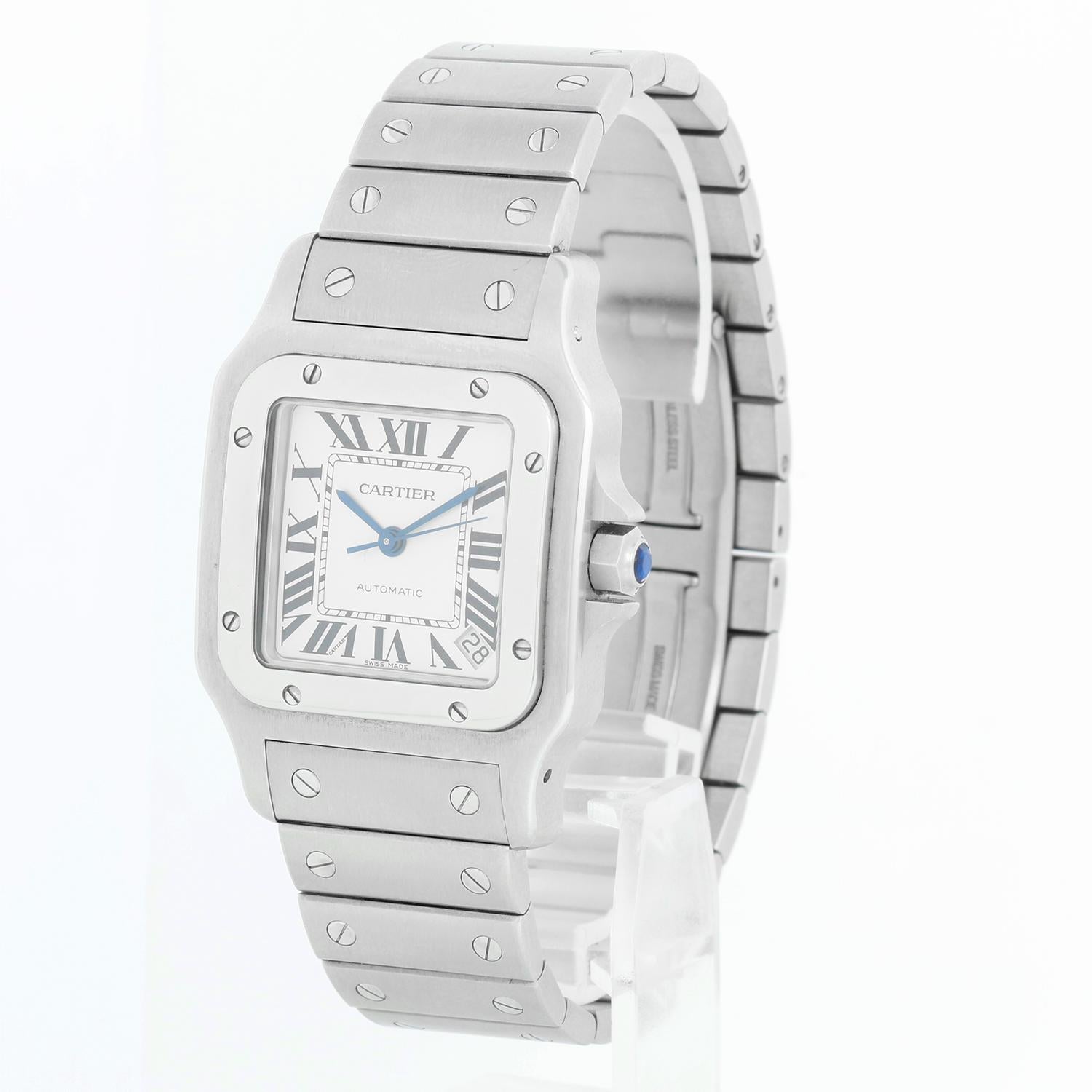 Cartier Santos Steel XL Automatic Men's Watch W20098D6 2823 - Automatic winding. Stainless steel case (34mm x 45mm). Silver dial with black Roman numerals and date at 5 o'clock. Stainless steel Cartier deployant style bracelet; Fits a 7 1/2 inch