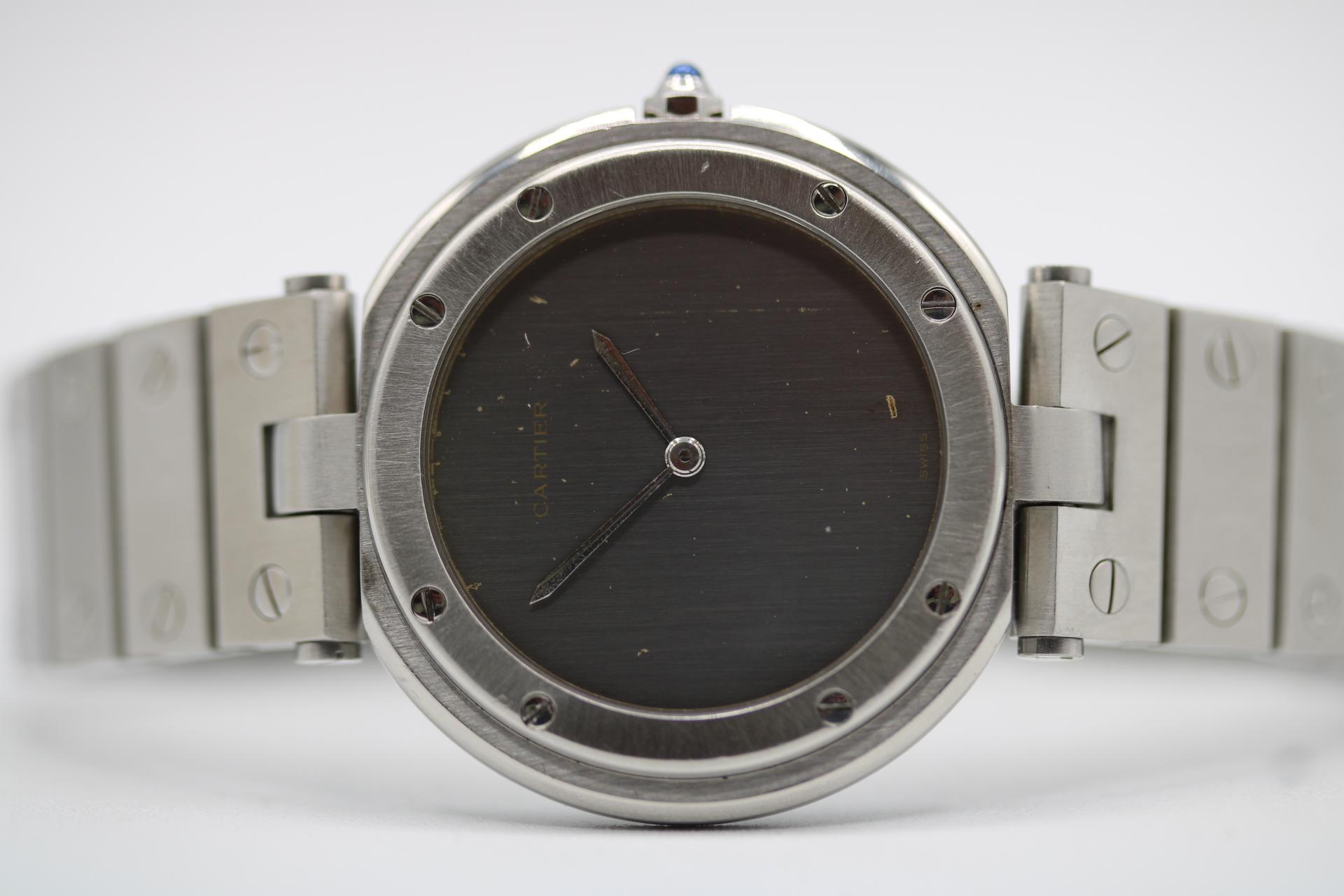 Cartier Santos Vendome 8192 Ghost Dial  33mm Stainless Steel  Recently Serviced  Affordable Luxury

The Cartier Santos Vendome with a Ghost dial is a rare find, offering a unique aesthetic that blends timeless elegance with modern craftsmanship.