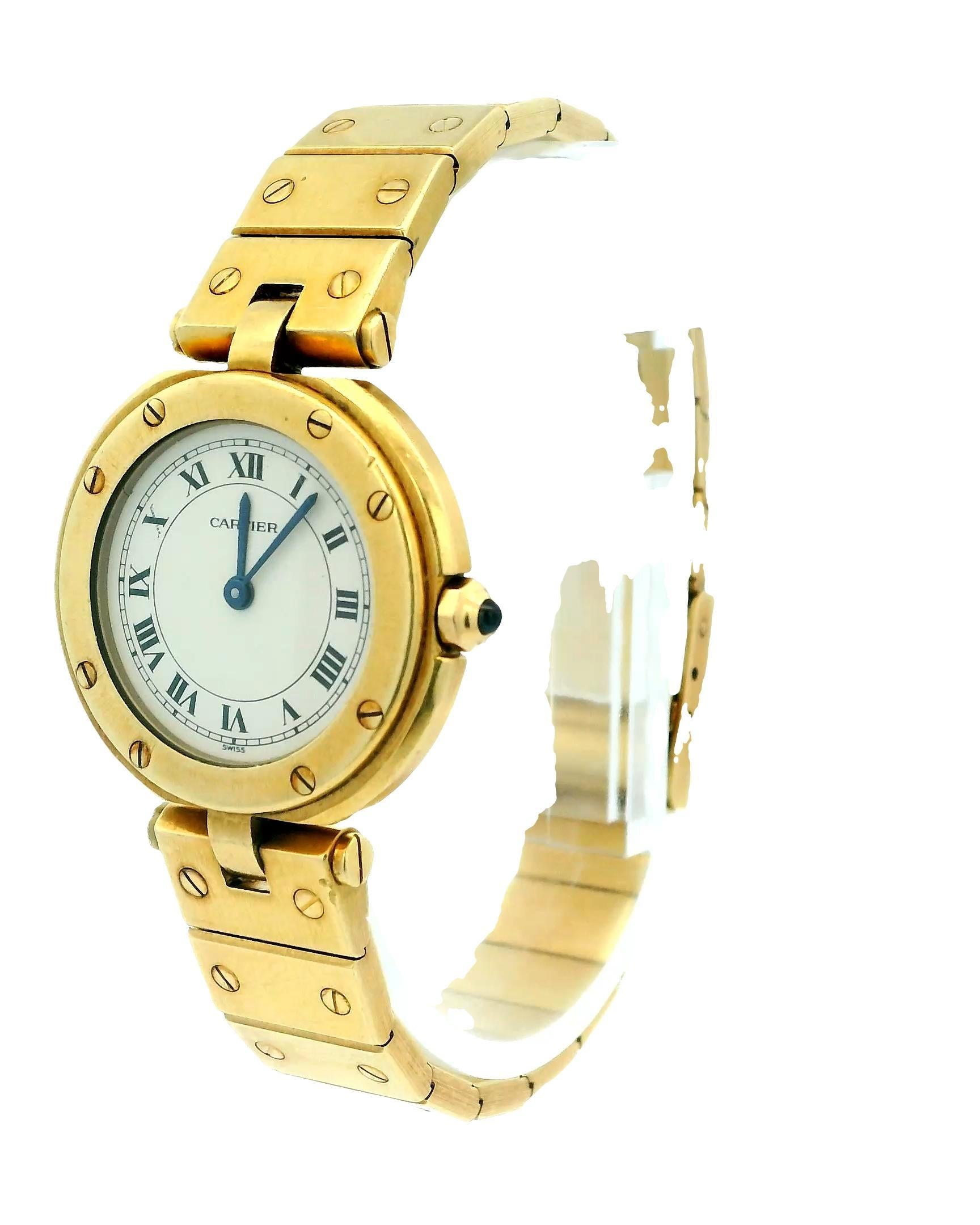 Cartier Santos Vendôme Ladies Watch 84738788. This elegant timepiece features a 27mm 18K yellow gold case and an 18K yellow gold bezel. The ivory dial is complemented by blue hands and Roman numeral hour markers, with minute markers displayed around