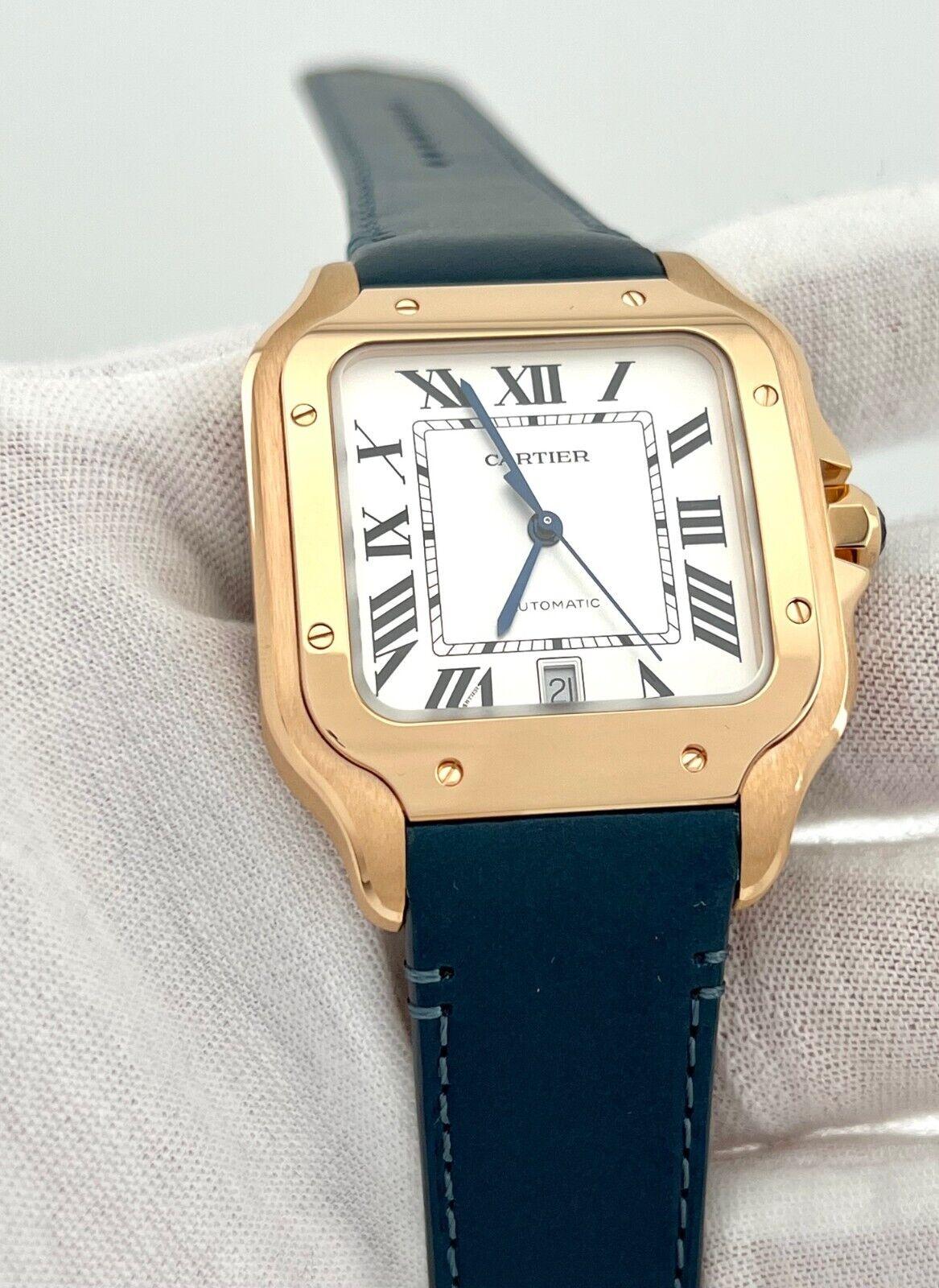 Style Number: WGSA0019 / Ref 4071 

Year: 2022

Model: Cartier Santos 

Case Material: 18K Rose Gold 

Band: Dark Grey Leather Strap with Additional Blue Leather Strap

Bezel: 18K Rose Gold 

Dial: Silver

Face: Sapphire Crystal 

Case Size: 47.5mm