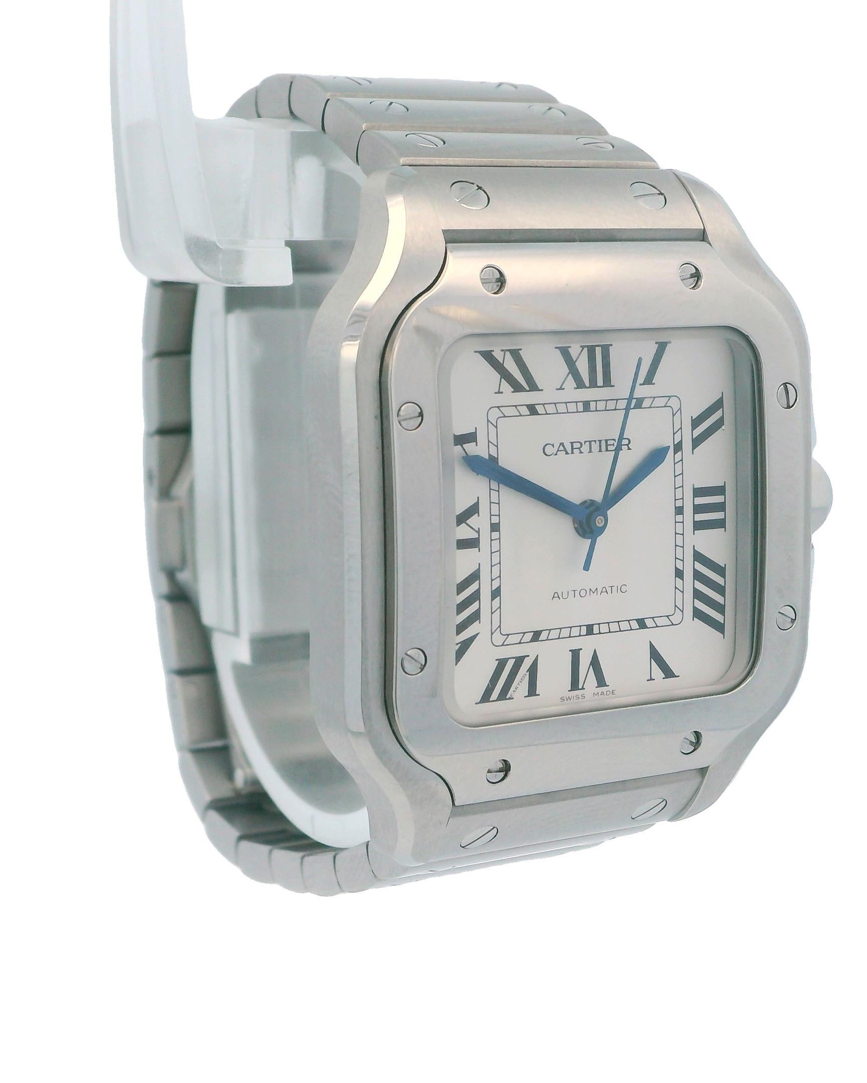 Cartier Santos De Cartier Ladies Watch WSSA0029. This watch features a 35mm stainless steel case with a fixed stainless steel bezel. The silver dial is accented with blue steel hands and black Roman numeral hour markers, along with minute markers on