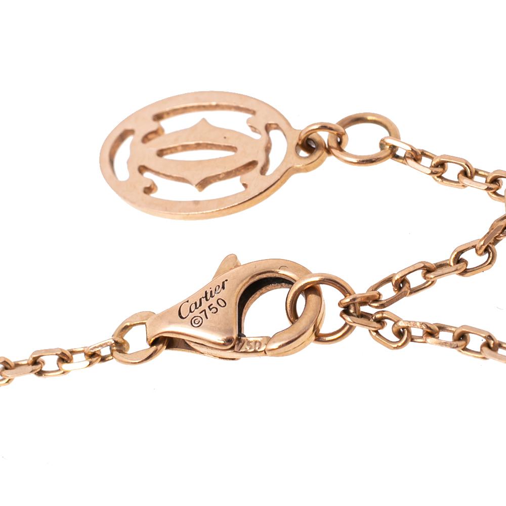 Simple is the new elegant and this bracelet from Cartier is a clear example of the same. The 18k rose gold chain bracelet is centered with a sapphire and finished with an adjustable lobster clasp. This understated piece is effortlessly stylish and