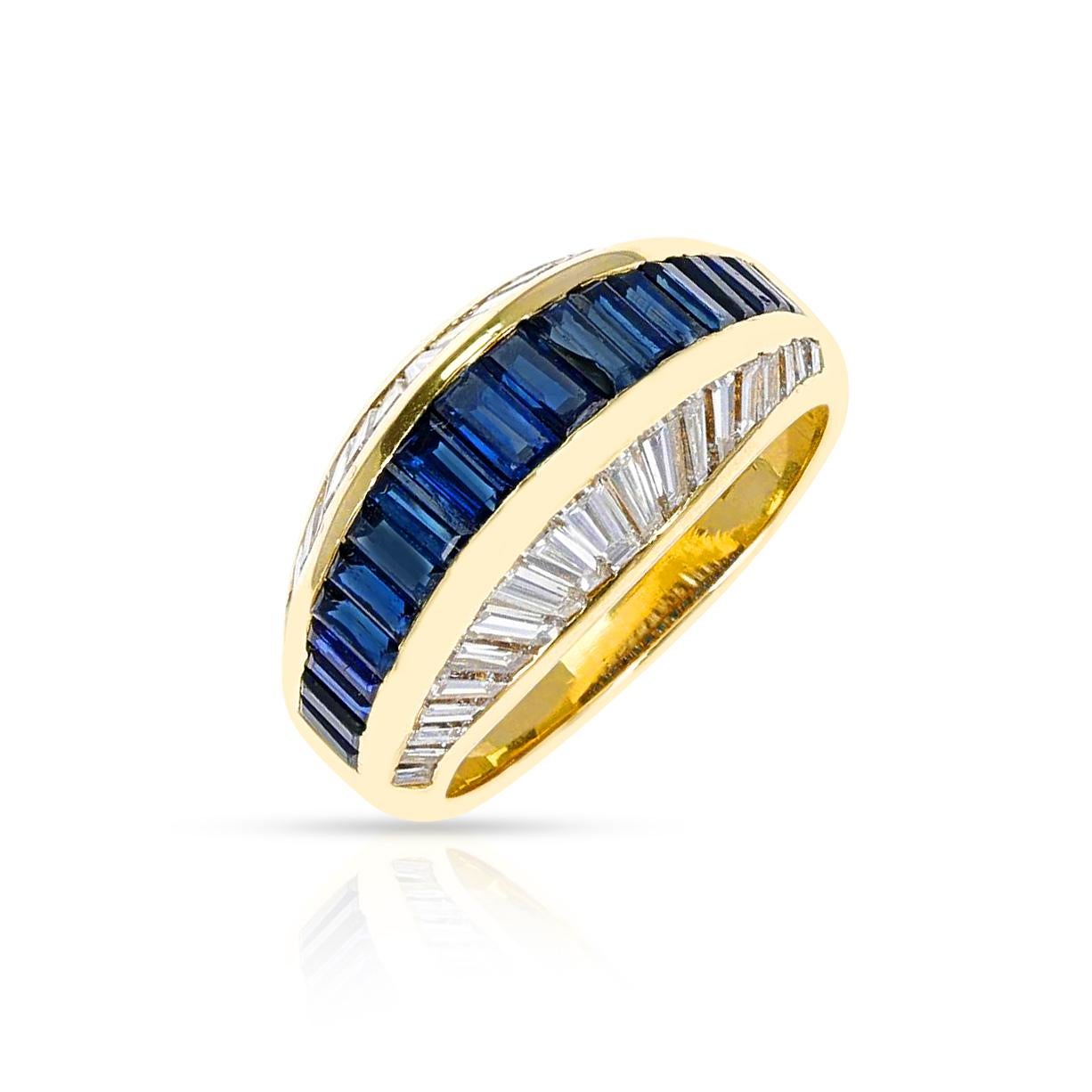 A stunning Cartier Sapphire and Diamond Baguette Ring made in 18 Karat Yellow Gold. The ring size is US 6. The total weight of the ring is 7.45 grams.