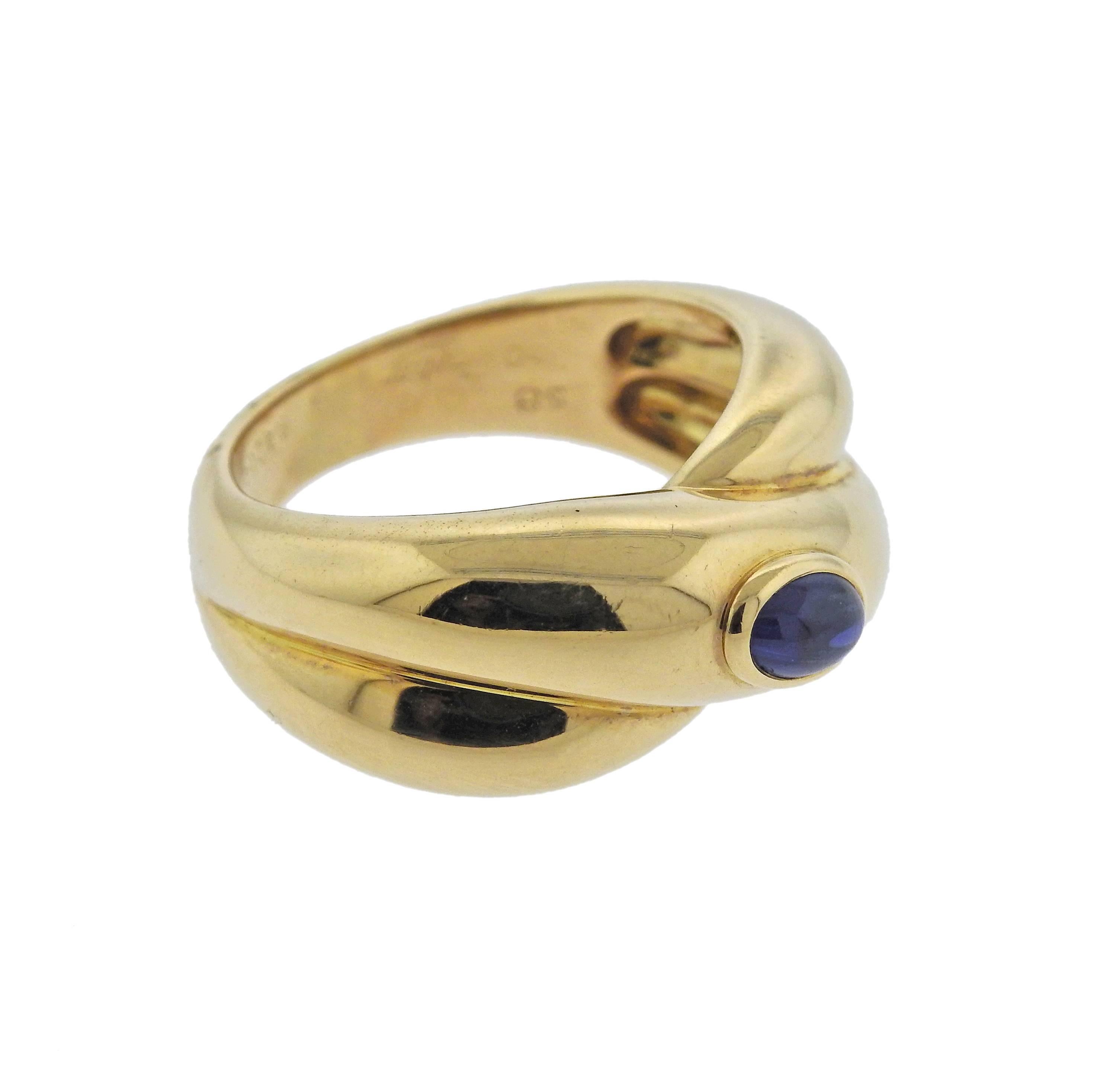 18k yellow gold sapphire ring crafted by Cartier.  Ring size -8.25, ring top - 11mm wide, weighs 11.1 grams. Marked: Cartier, 58, 750, B42140, 1992.