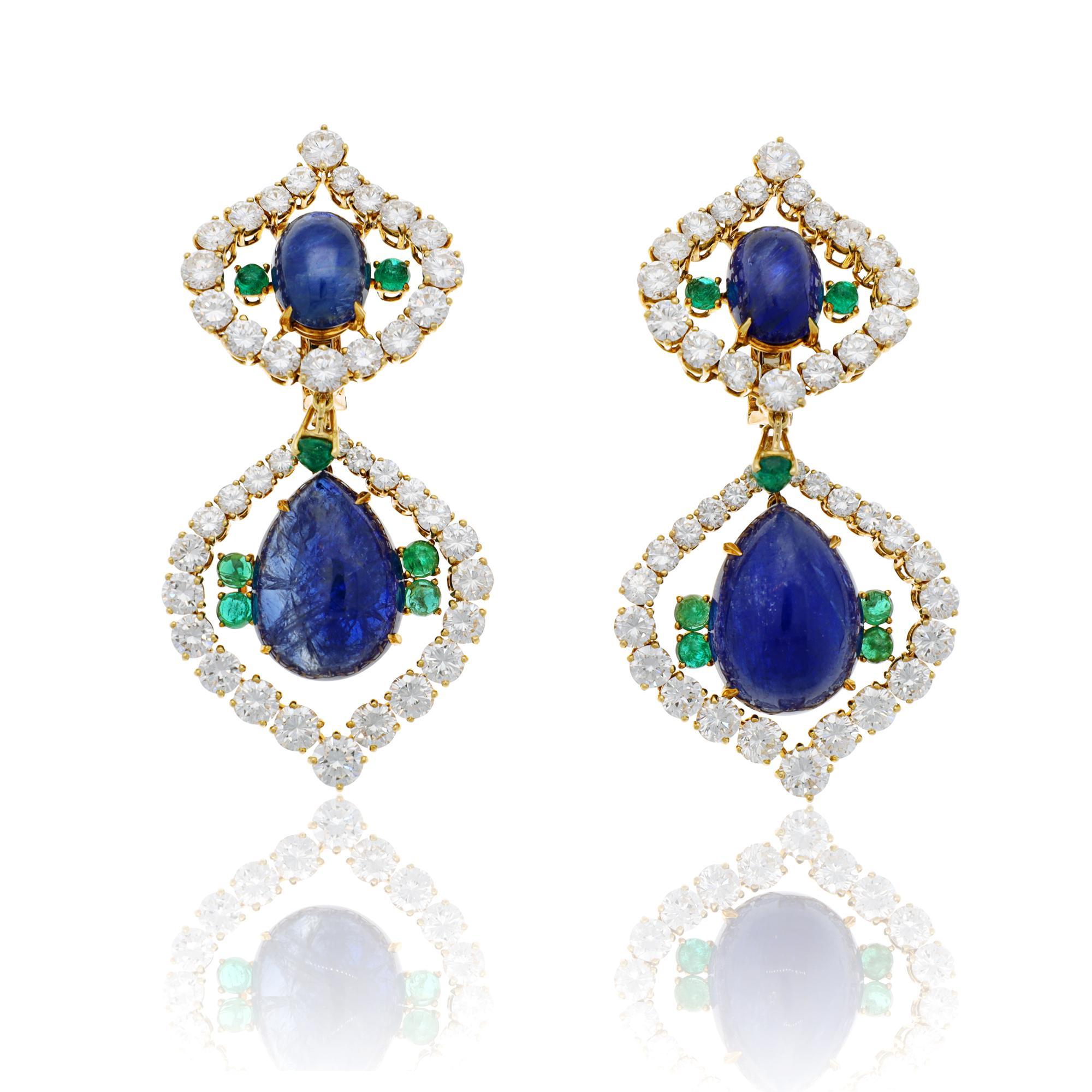 Cabochon Sapphires, Cabochon Emeralds, and Round-Brillant Diamonds.
Necklace Approximate Weights - Sapphires 131.69 CTS, Diamonds 79.30, Emeralds 18.29 CTS
Earrings Approximate Weights - Diamonds 18.58 CTS, Emeralds 3.94 CTS
Approximate Necklace