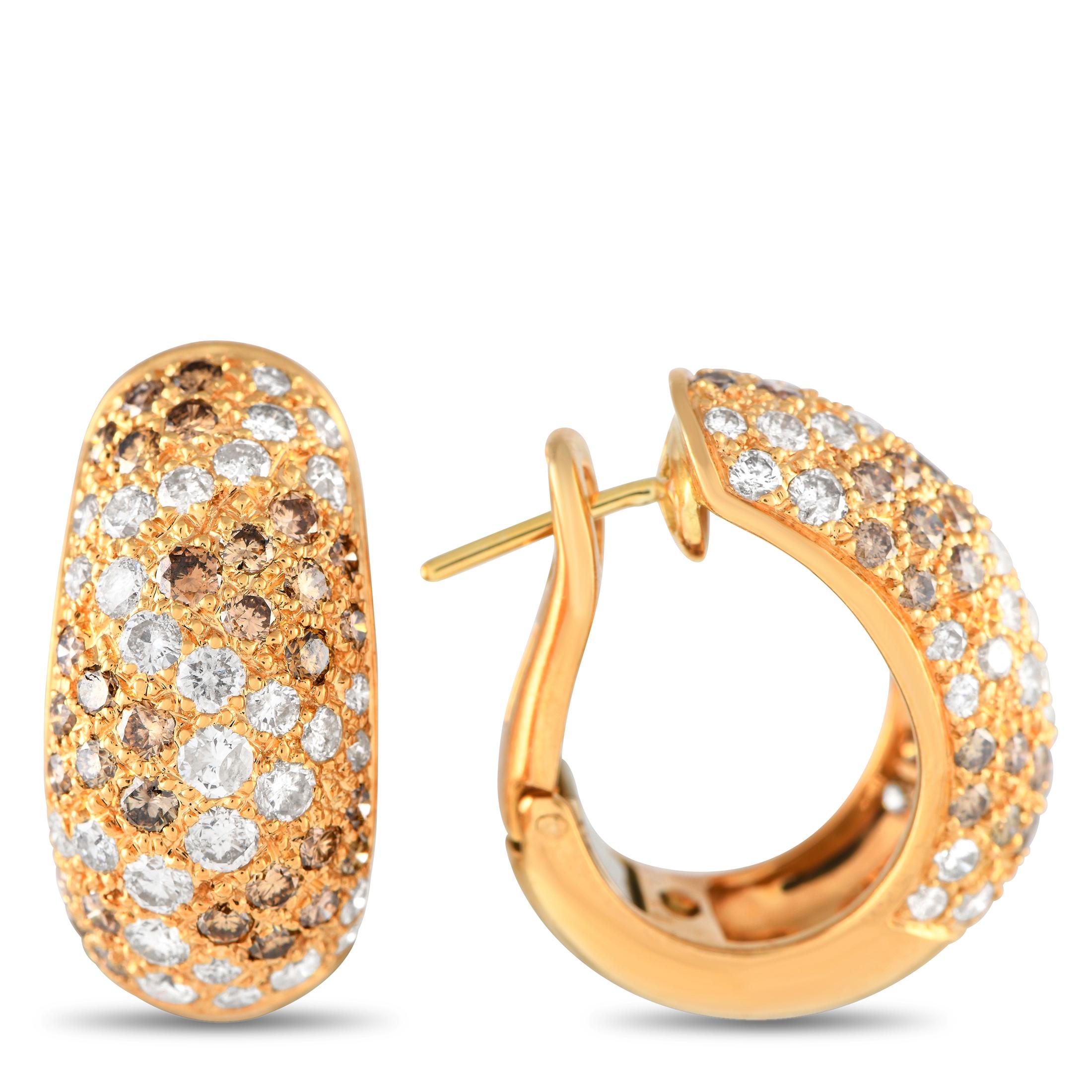 Multicolored Diamonds add texture, dimension, and visual impact to these impressive Cartier Sauvage earrings. The sophisticated 18K Yellow Gold setting measures 0.85 long, 0.75 wide, and features a delicately curved design.This jewelry piece is