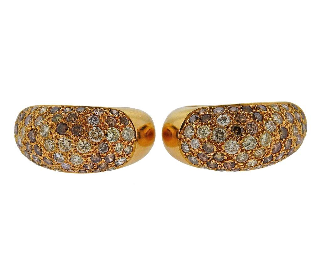 Pair of 18k gold hoop earrings from Sauvage collection, crafted by Cartier, adorned with approx. 3.00ctw in fancy color diamonds. Earrings are 22mm x 11mm. Weight is 12.8 grams. Marked Cartier, 1994, C3308 750.