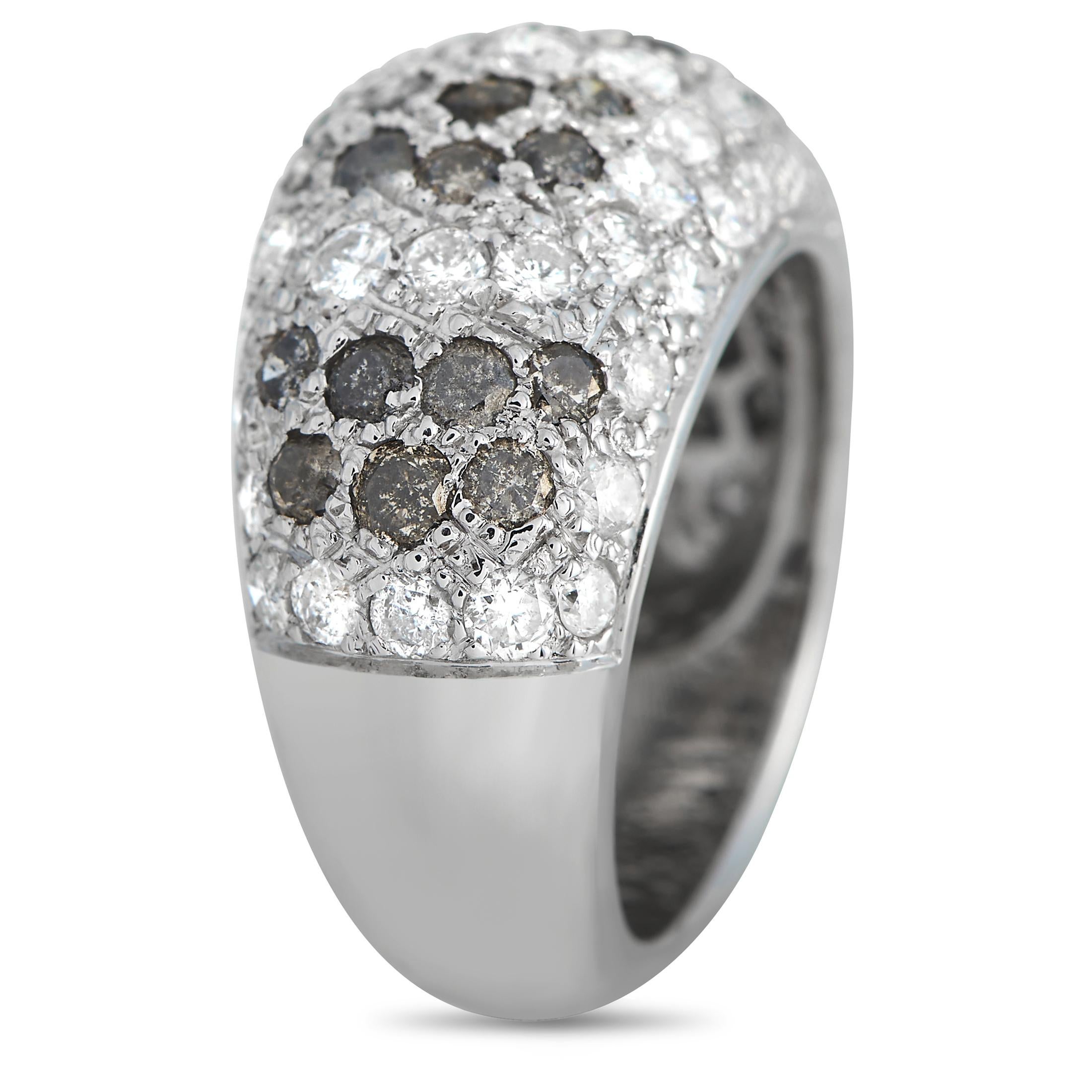 The Cartier Sauvage Mtissage diamond ring is sure to impress. This gorgeous piece indeed features a wild mix of luxury and style. The 18K white gold band bomb-shaped ring shines with pav-set brilliant white and fancy grey diamonds. The ring's top