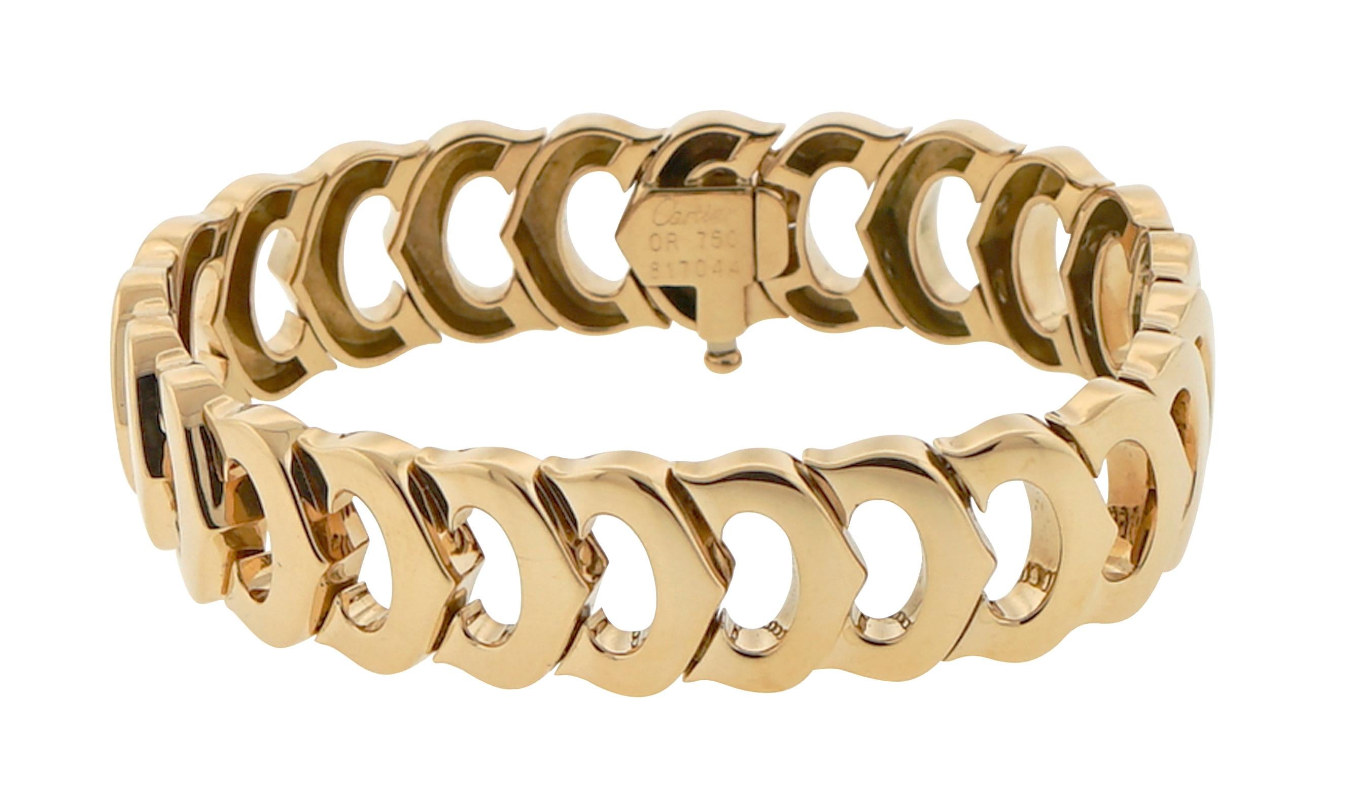 The bracelet is 7 inches in length, made of 18K yellow gold, and weighs 31.00 DWT (approx. 48.21 grams). Beautiful condition. This is the wider of the two sizes