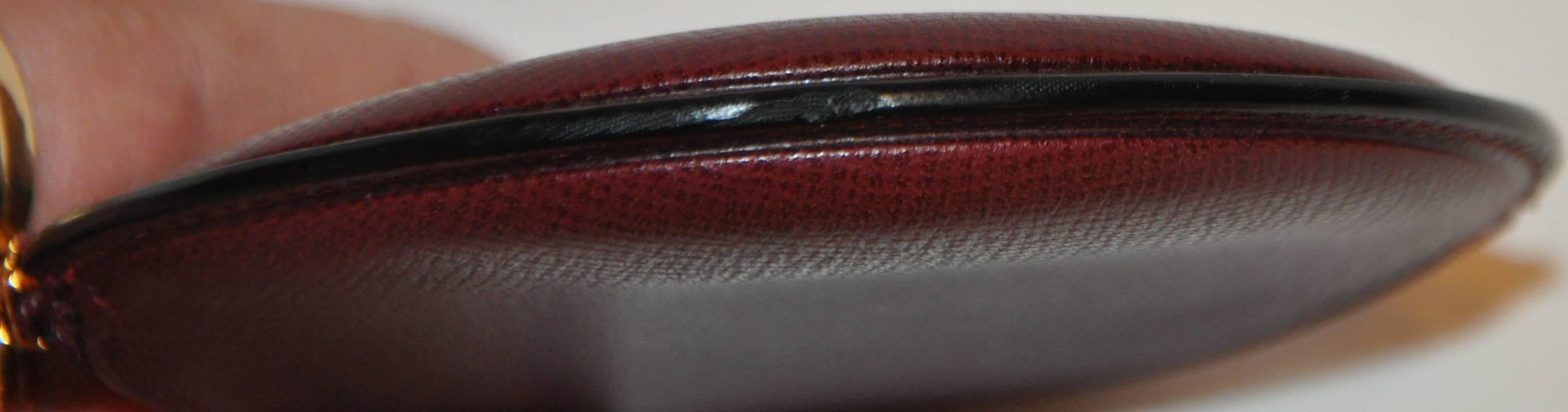 Cartier Signature Embossed Burgundy Textured Calfskin Zippered Change Purse  In Good Condition In New York, NY