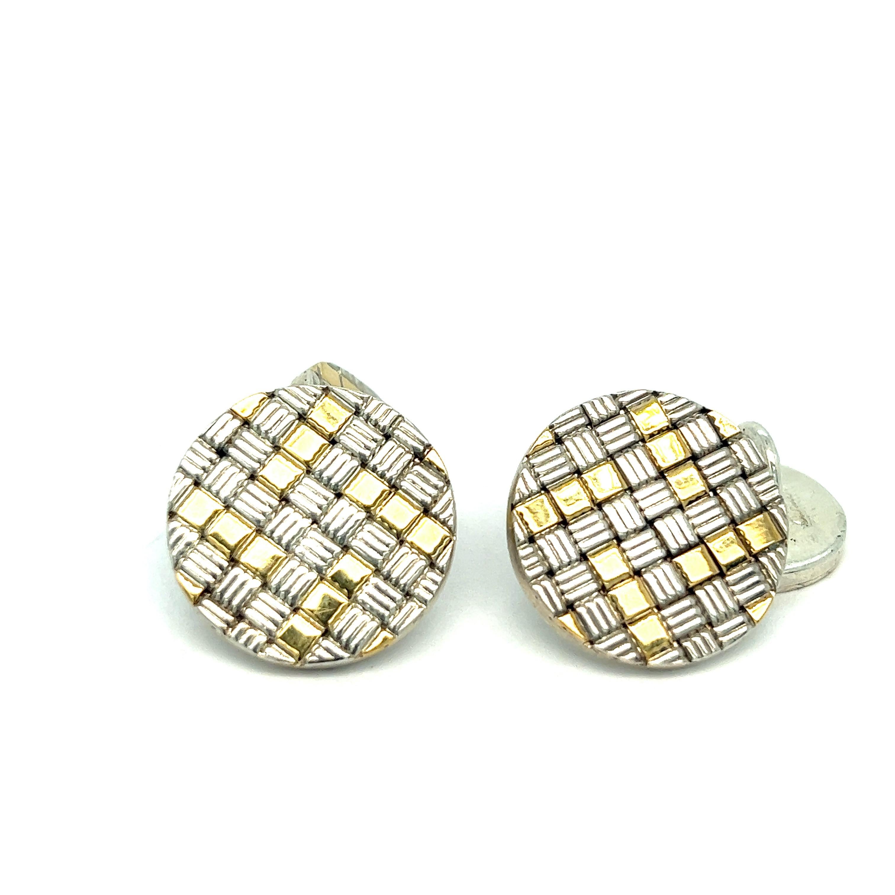 Pair of 18k gold and sterling silver large cufflinks by Cartier. Each top is 19 mm in diameter, back - 14 mm.  Marked: Cartier, Sterling, 18k. Weight - 18.2 grams.