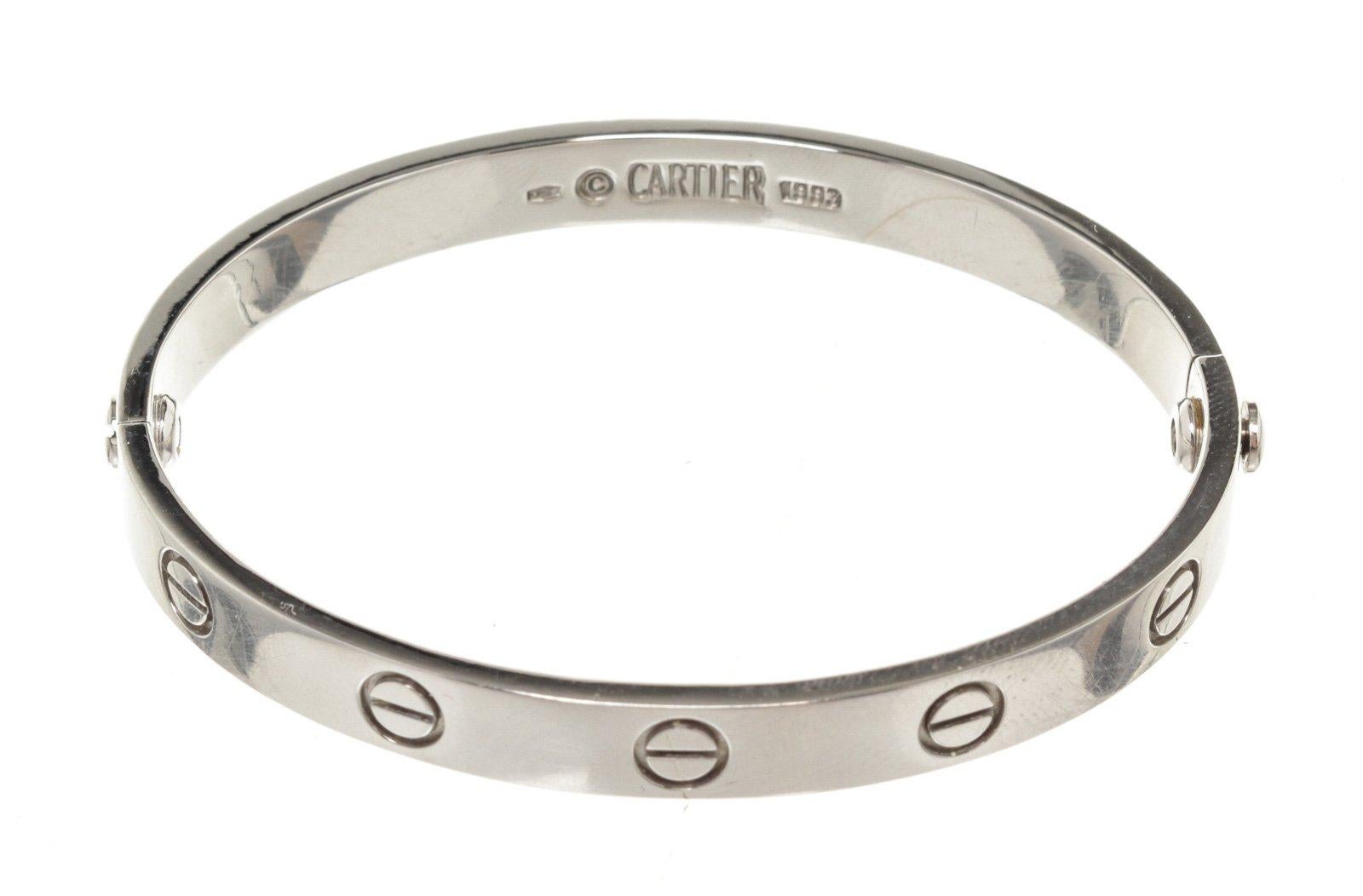 Cartier Silver Love 20 Bracelet with silver-tone hardware. 

47106MSC