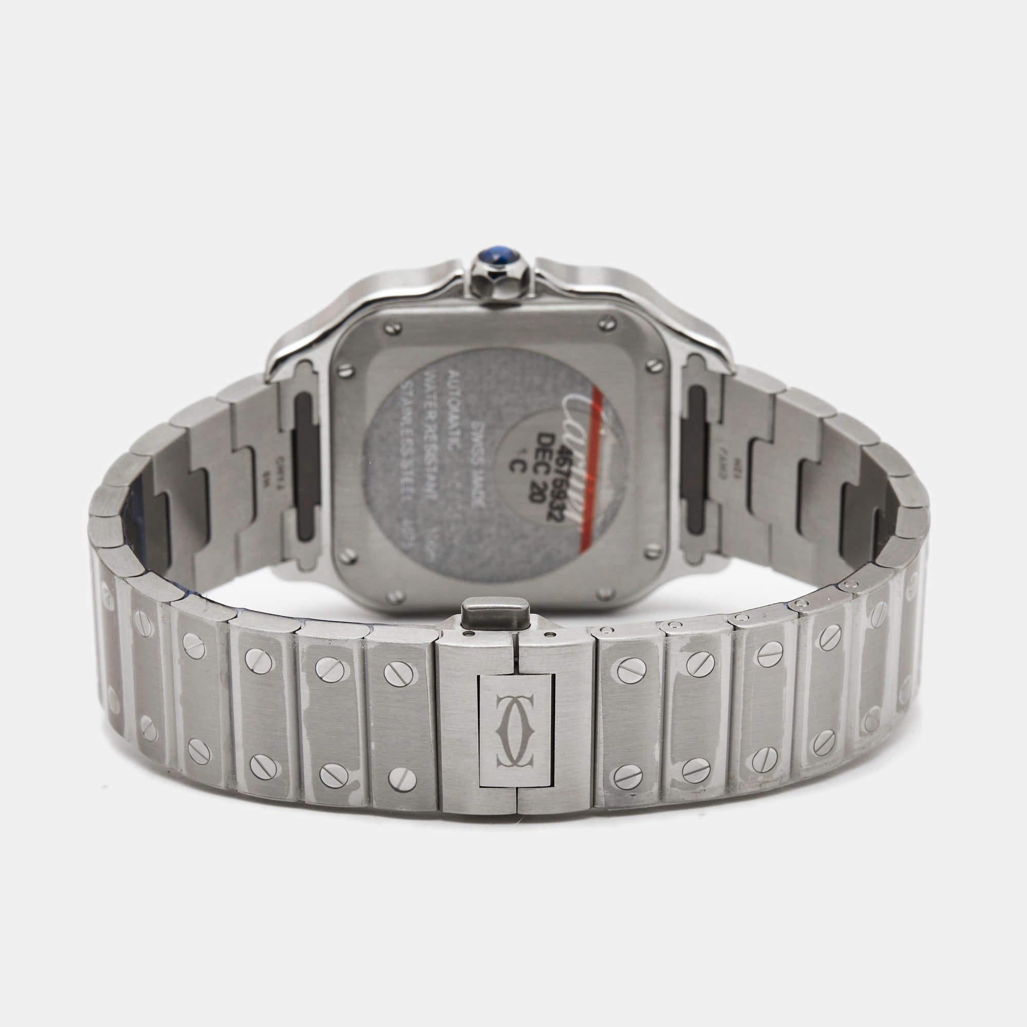 The Cartier Santos WSSA0010 watch is a refined blend of elegance and functionality. Its sleek stainless steel case houses a captivating silver-hued dial, adorned with Roman numeral hour markers and blued hands. The iconic square shape, inspired by