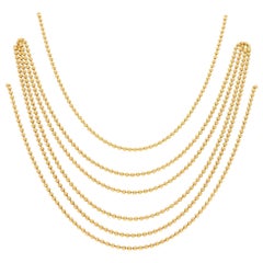 Cartier Six Strand Draperie Necklace Set in 18 Karat Yellow Gold