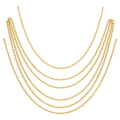 Cartier Six Strand Draperie Necklace Set in 18 Karat Yellow Gold