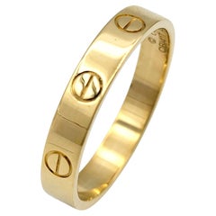 Cartier Small Model LOVE Band Ring in Polished 18 Karat Yellow Gold Size 57