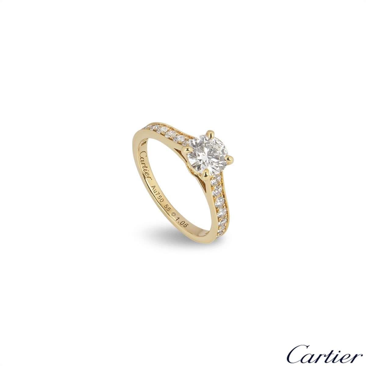 A beautiful 18k yellow gold diamond ring from the Solitaire 1895 collection by Cartier. The ring is set to the centre with a 1.06ct round brilliant cut diamond, H colour and VVS1 in clarity. The diamond scores an excellent rating in all three