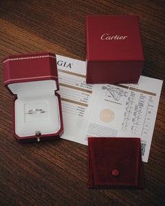 Cartier, anello con diamante solitario 1895 taglio rotondo GIA 0,21 carati E/VVS2