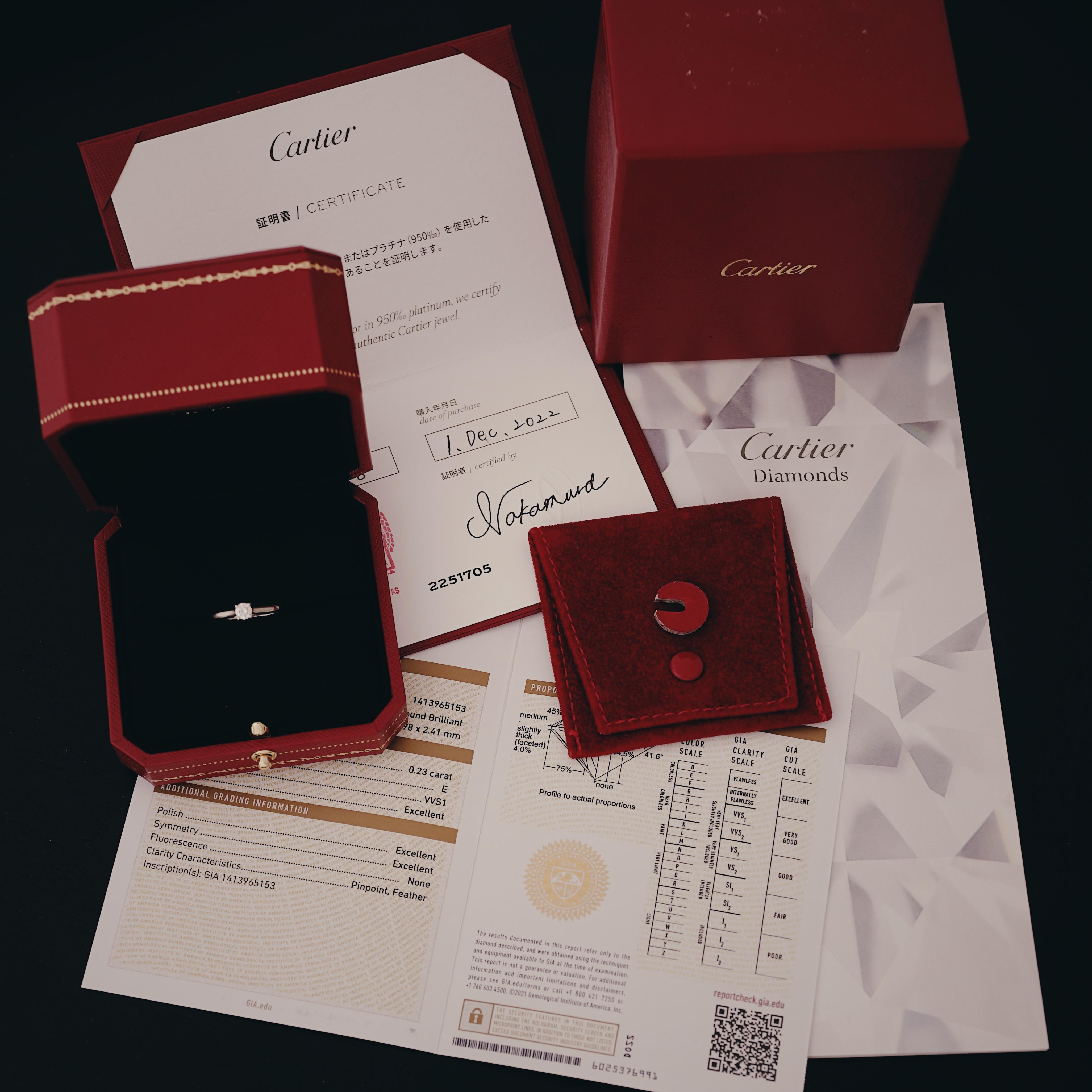 Cartier, Solitaire 1895,
Round Brilliant Cut
GIA certified 0,23 Carat, E Color and VVS1 Clarity and Triple X quality.
Mounted in Platinum 950/1000.
Signed Cartier, and numbered. Size 48 (US 4.75).
GIA number inscribed, report N° 1413965153
Comes