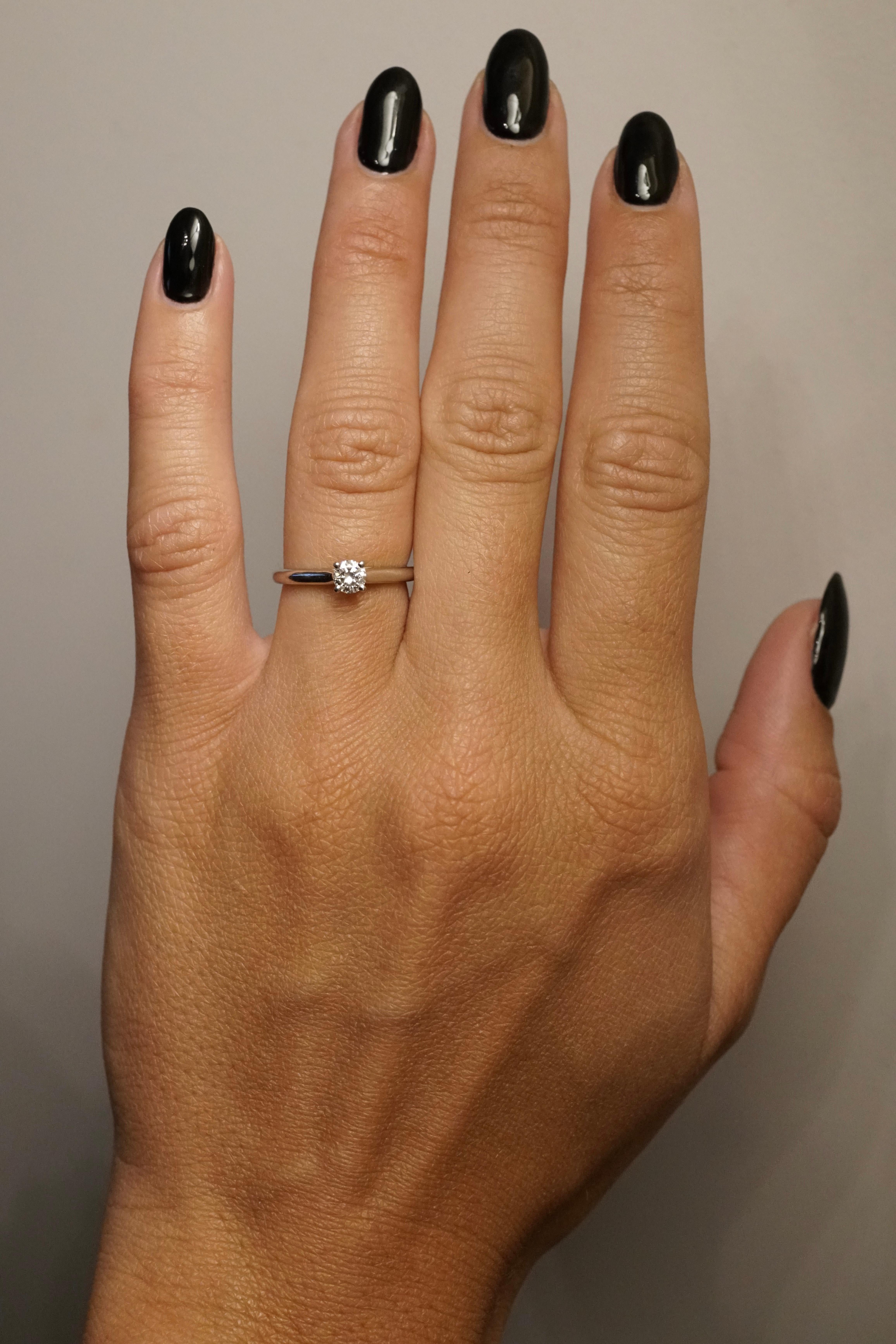 Contemporary Cartier, Solitaire 1895 Round Cut GIA 0.23 Carat E/VVS1 Diamond Ring