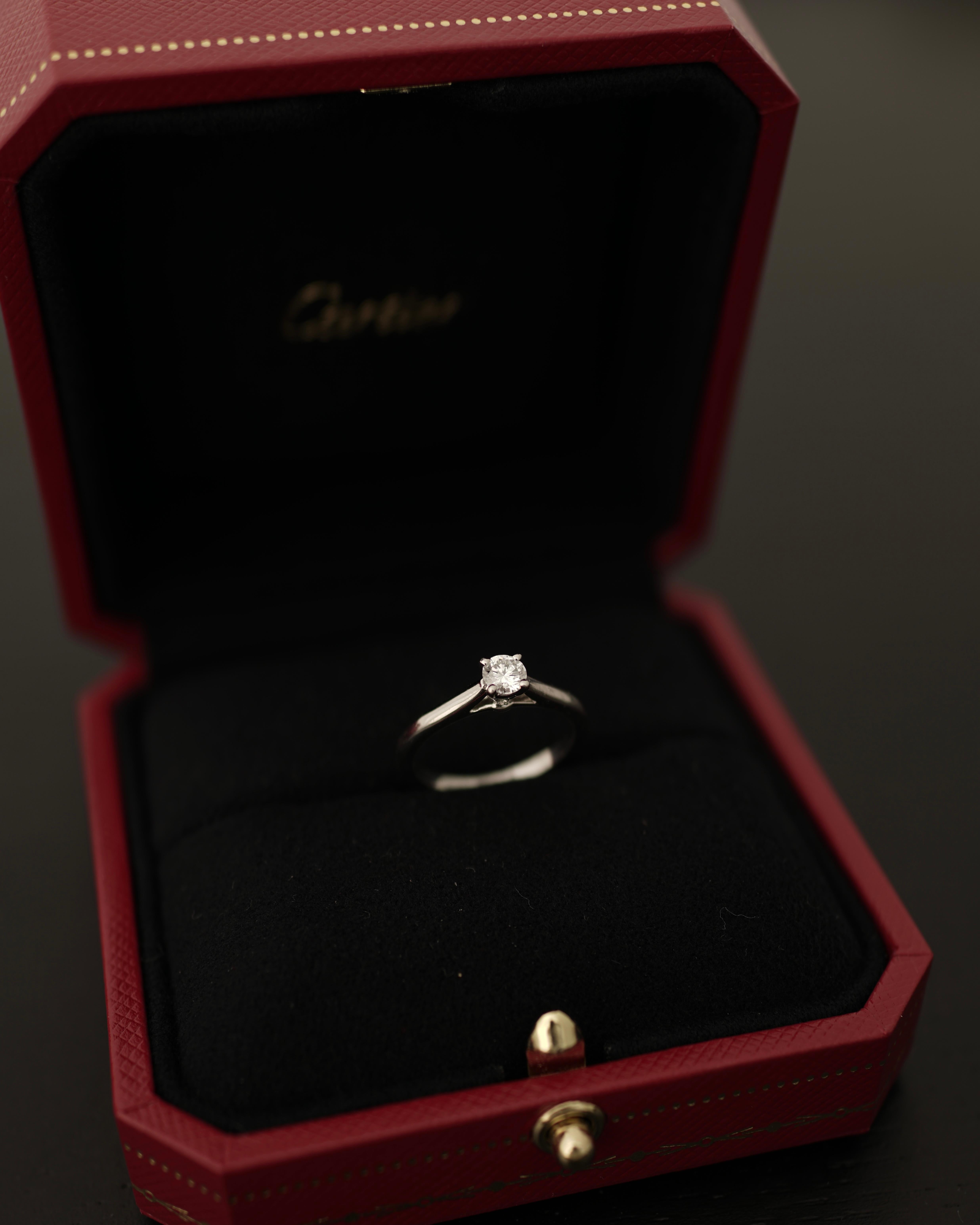 Women's Cartier, Solitaire 1895 Round Cut GIA 0.23 Carat E/VVS1 Diamond Ring