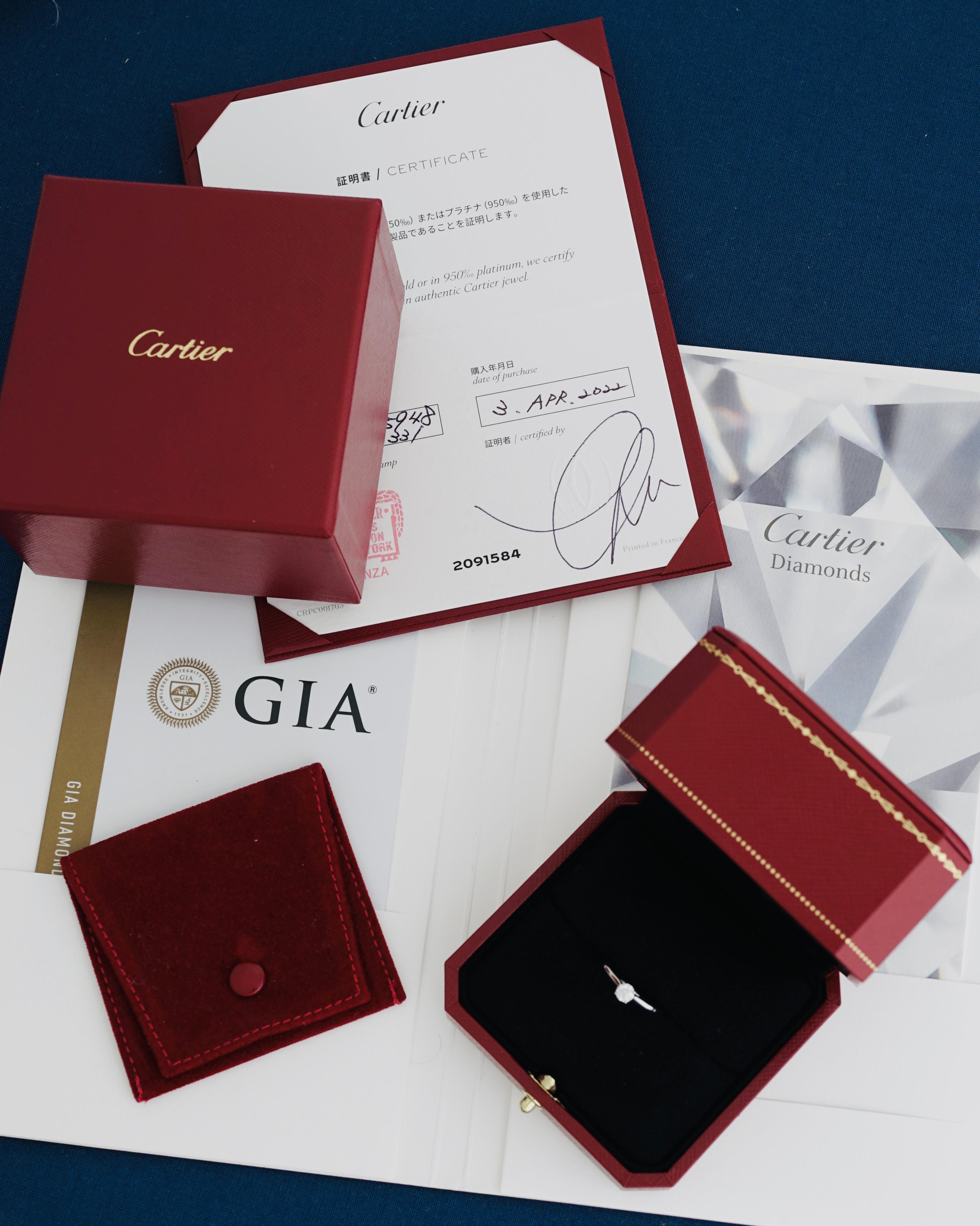 Cartier, Solitaire 1895,
Round Brilliant Cut
GIA certified 0,27 Carat, F Color and VVS2 Clarity and Triple X quality.
Mounted in Platinum 950/1000.
Signed Cartier, and numbered. Size 48 (US 4.5).
GIA number inscribed, report N°7381443343
Comes full