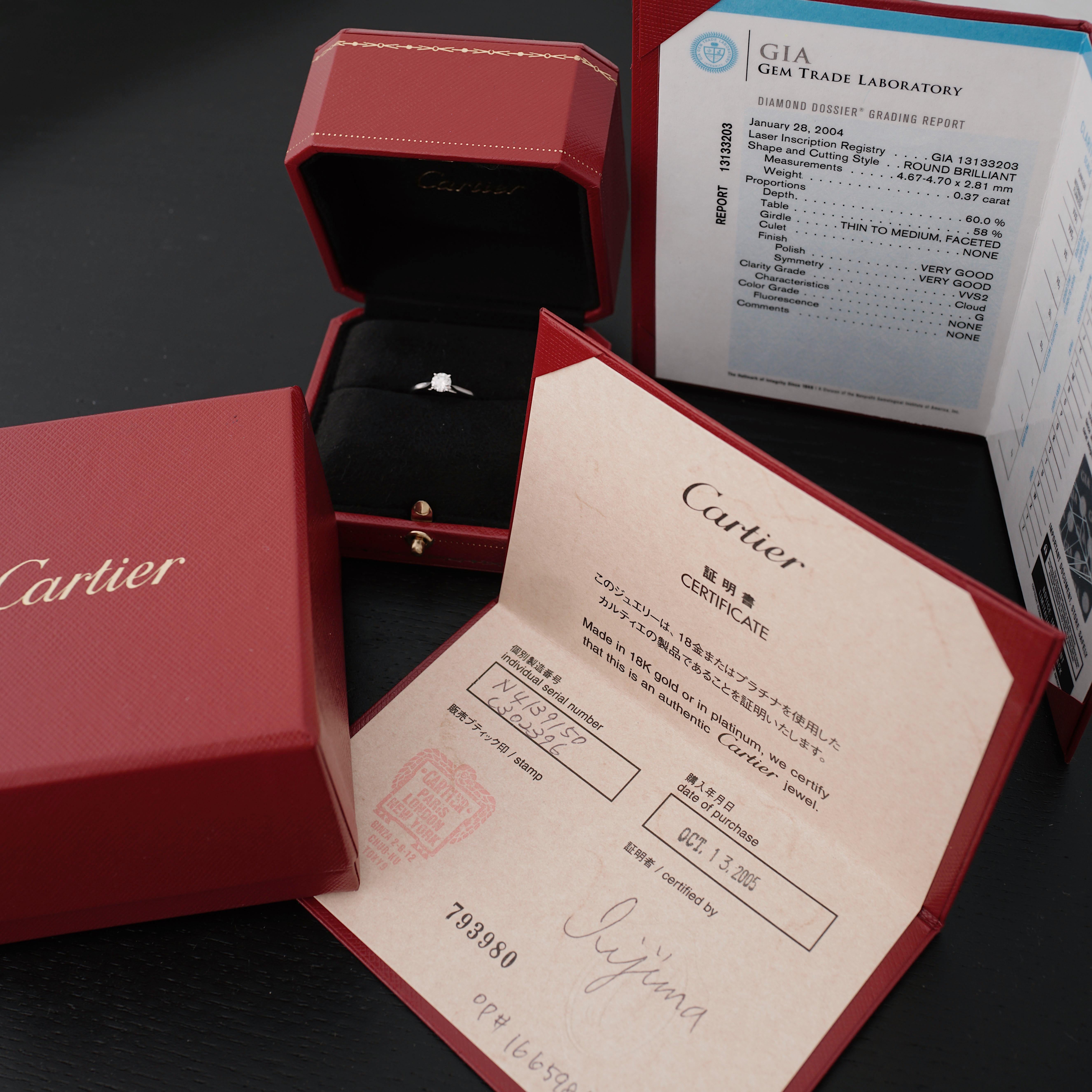 Cartier, Solitaire 1895,
Round Brilliant Cut
GIA certified 0,37 Carat, G Color and VVS2 Clarity and Triple X quality.
Mounted in Platinum 950/1000.
Signed Cartier, and numbered. Size 50 (US 5 1/8).
GIA number inscribed, report N° 13133203
Comes full