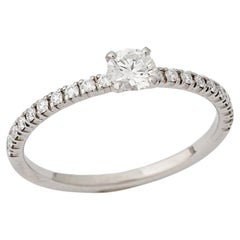 Cartier, Solitaire "Etincelle" Round Cut GIA 0.19 Carat D/VVS1 Diamond Ring