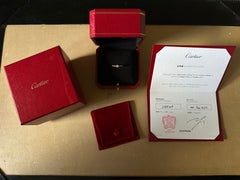 Cartier, Solitaire "Etincelle" Round Cut GIA 0.22 Carat E/VVS2 Diamond Ring