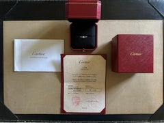 Cartier, Solitaire "Etincelle" Round Cut GIA 0.31 Carat G/VVS1 Diamond Ring