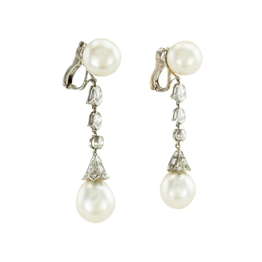 Cartier South Sea pearls and diamond platinum drop clip-on earrings circa 1990. *

ABOUT THIS ITEM:  #E-DJ615D. Scroll down for detailed specifications.  These Cartier South Sea cultured pearls and diamond drop earrings are a true masterpiece of
