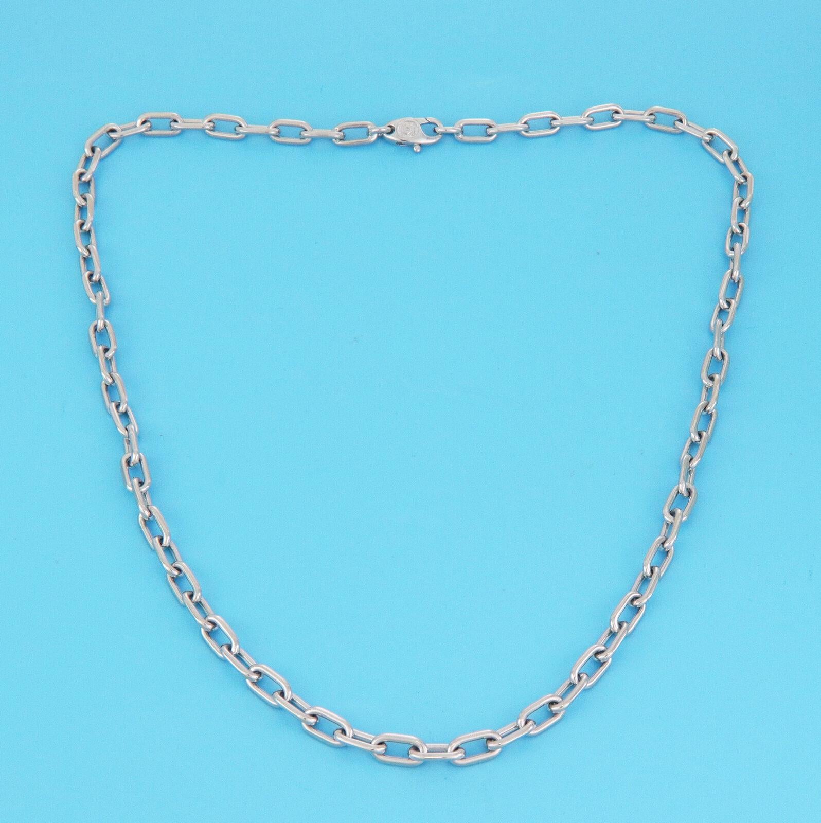 From the Spartacus Collection by Cartier, this bold chain is crafted from 18k white gold in a high polished finish. The necklace features long solid oval links and fastens with a large lobster clasp with the double C logo.  It has the designer