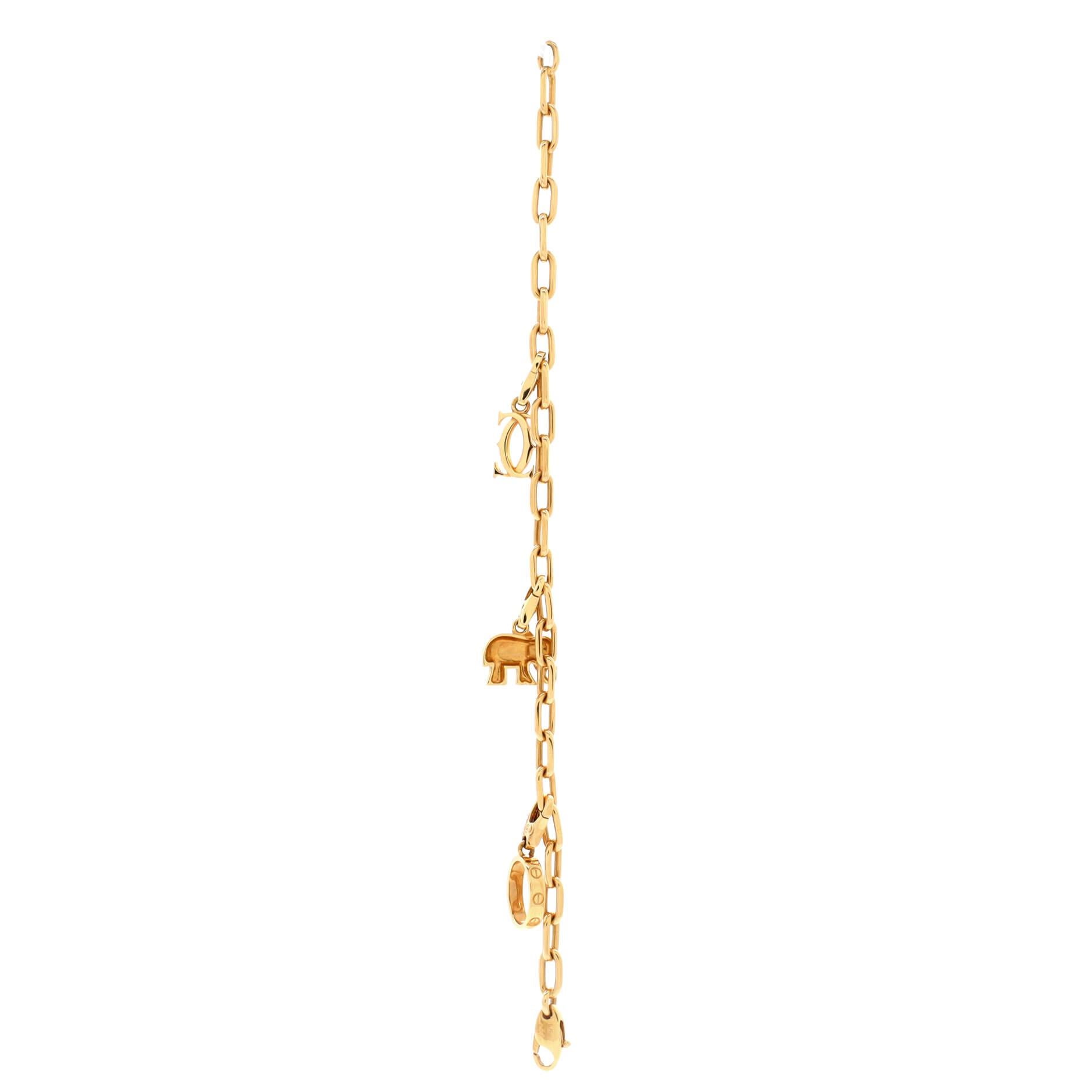 Cartier Spartacus 3 Charm Bracelet 18k Yellow Gold with Emerald In Good Condition In New York, NY