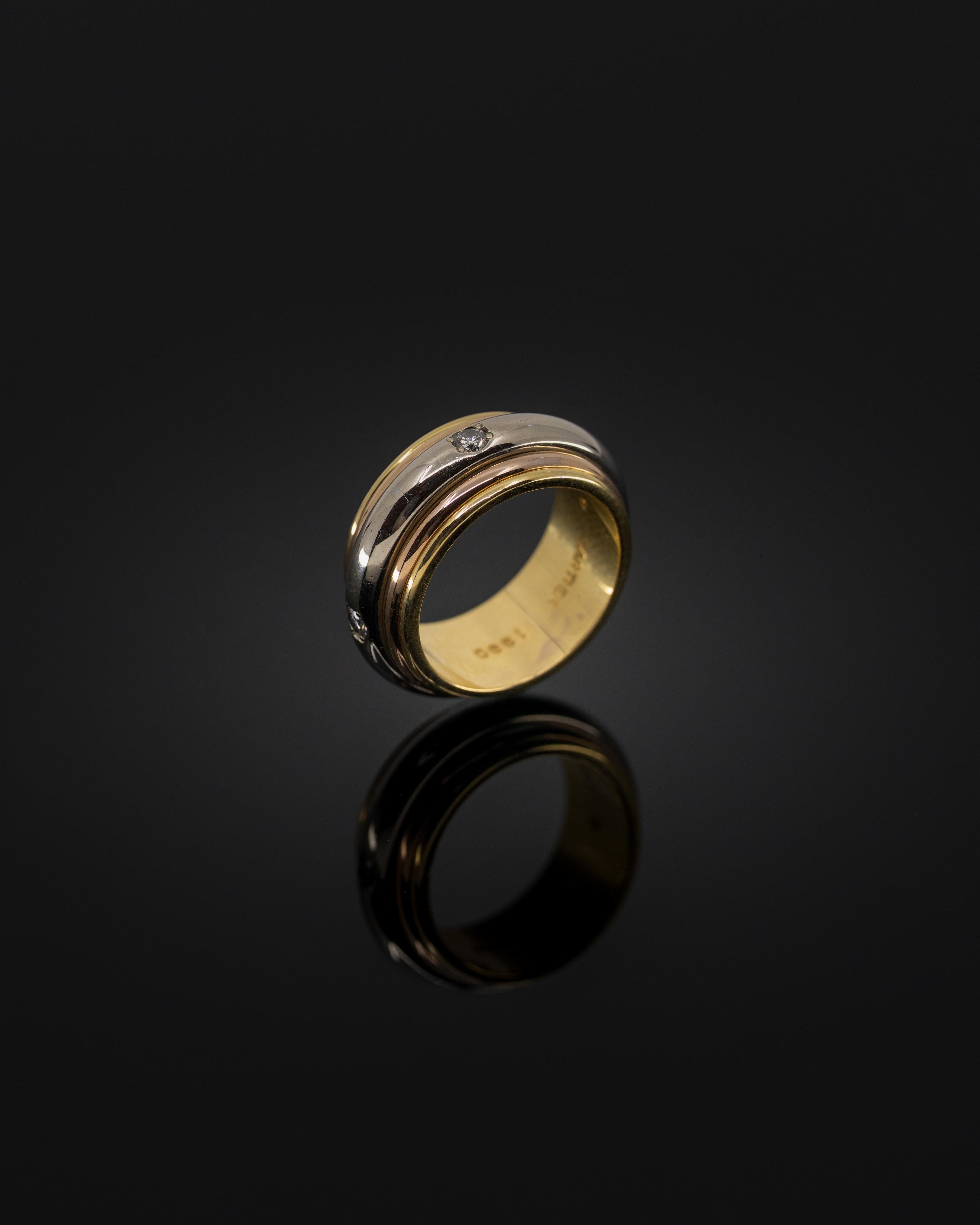 Cartier Trinity Ring: A Love That Knows No Bounds
The soft glow of candlelight flickered against the gold band as he turned the ring in his fingers. Three bands, three metals, seamlessly intertwined—just like their story.

He remembered the first