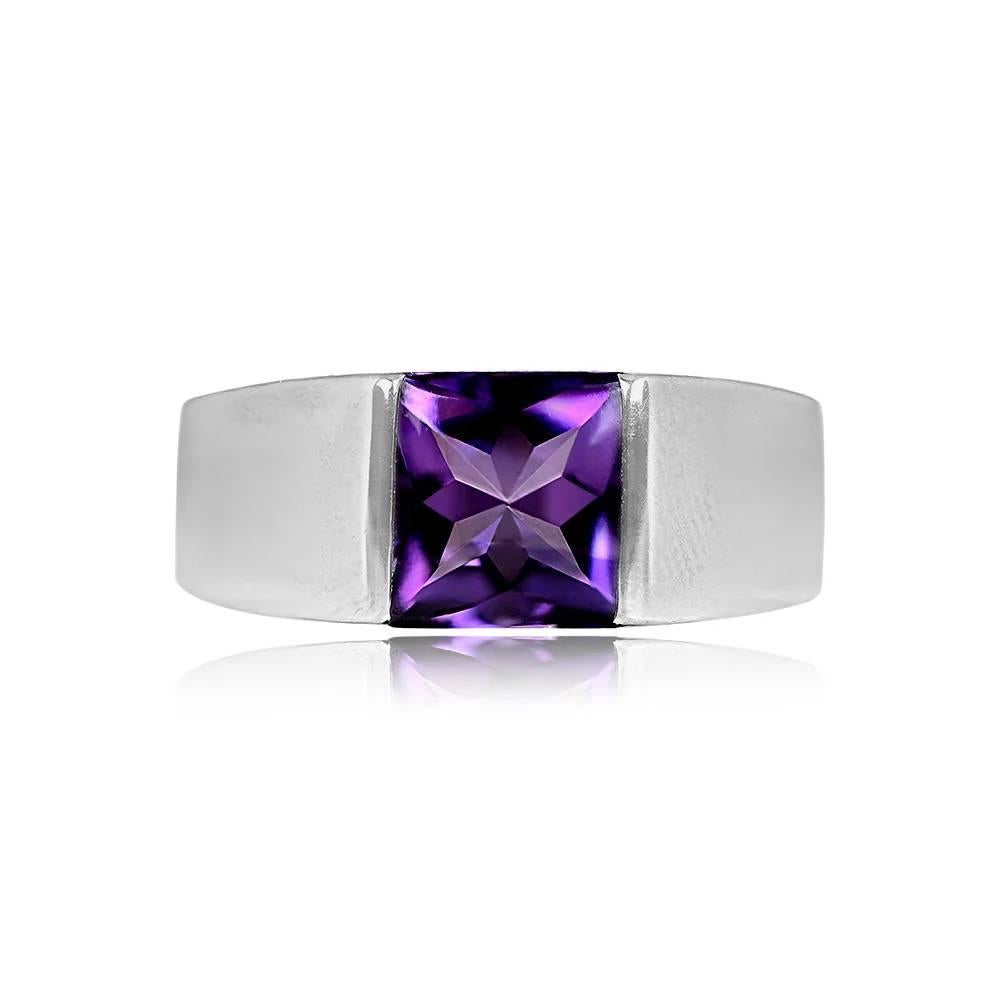The ring showcases a stunning square-cut amethyst center stone, set in luxurious 18k white gold. Crafted by Cartier, it reflects exquisite craftsmanship and timeless elegance.

Ring Size: 7 US, Resizable
Signed: Cartier
Metal: Gold, White