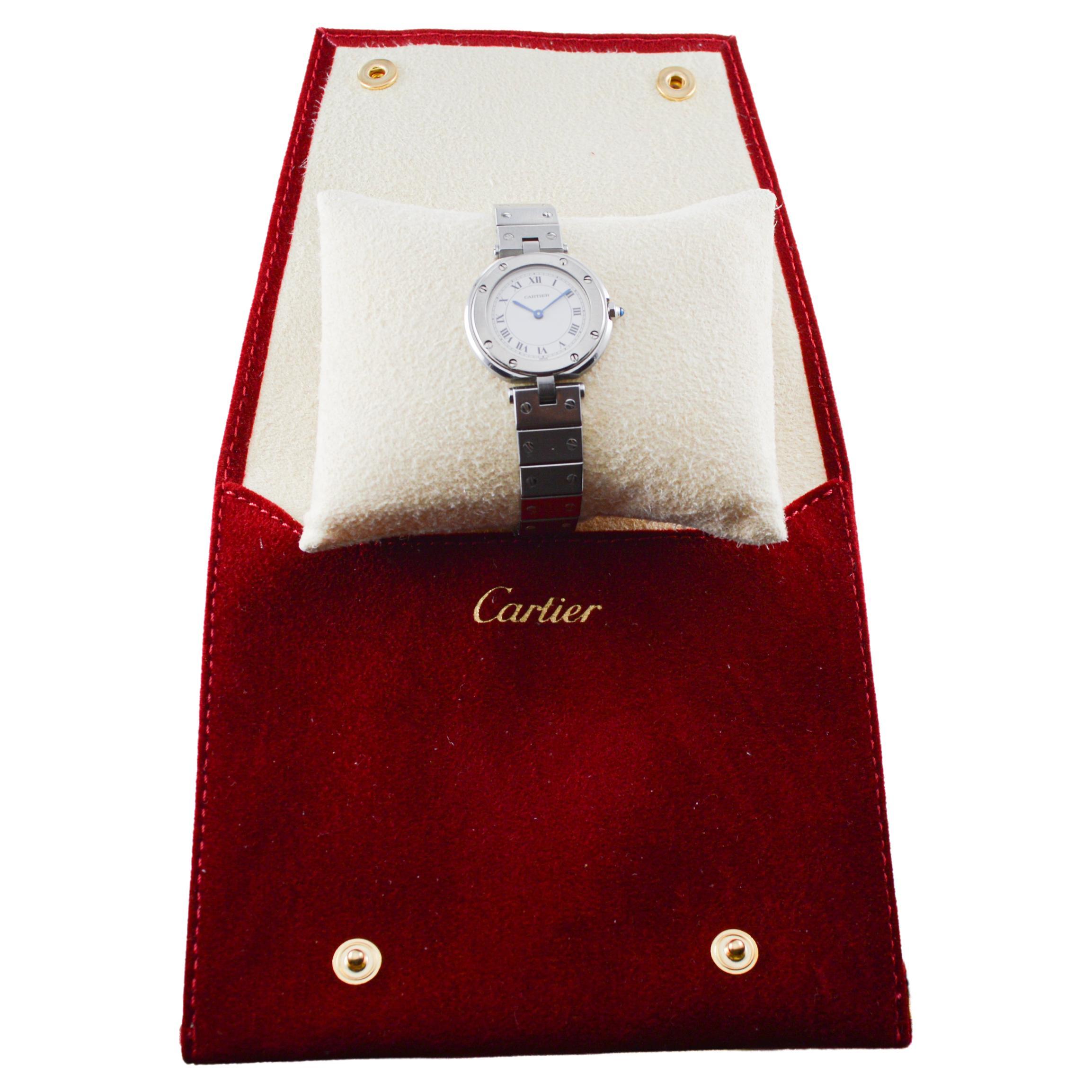 FACTORY / HOUSE: Cartier Watch Company
STYLE / REFERENCE: Centre / Santos Series 
METAL / MATERIAL: Stainless Steel
CIRCA / YEAR: 2000
DIMENSIONS / SIZE: Length 33mm X Diameter 27mm
MOVEMENT / CALIBER: Quartz / 7 Jewels  
DIAL / HANDS: Original