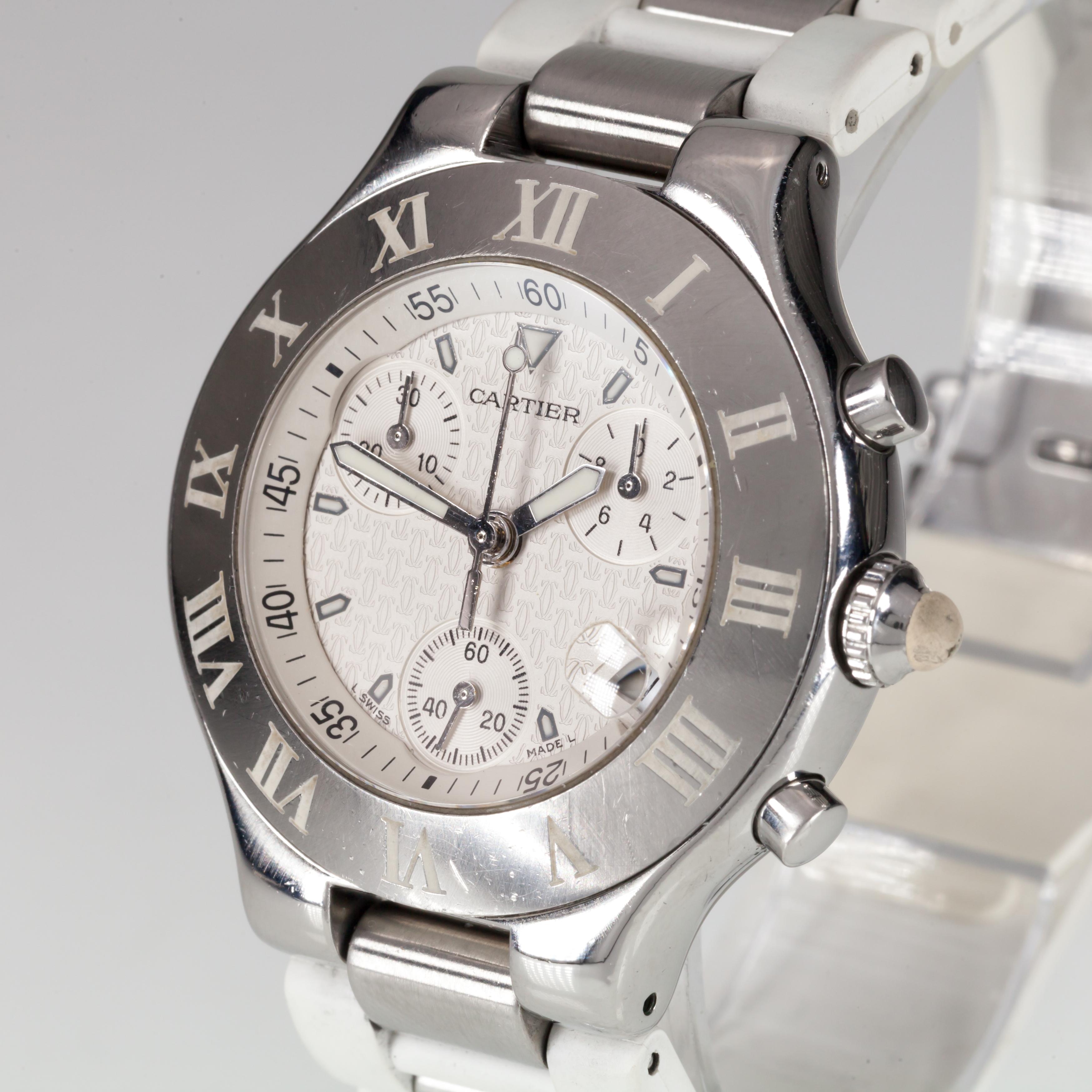 Model #2424
Serial #806827LX

Stainless Steel Case w/ Etched Roman Numeral Bezel
37 mm in Diameter (42 mm w/ Crown)
NOTE: Some minor damage to rubber accent on crown
Lug-to-Lug Distance = 43 mm
Lug-to-Lug Width = 10 mm
Thickness = 10 mm

White