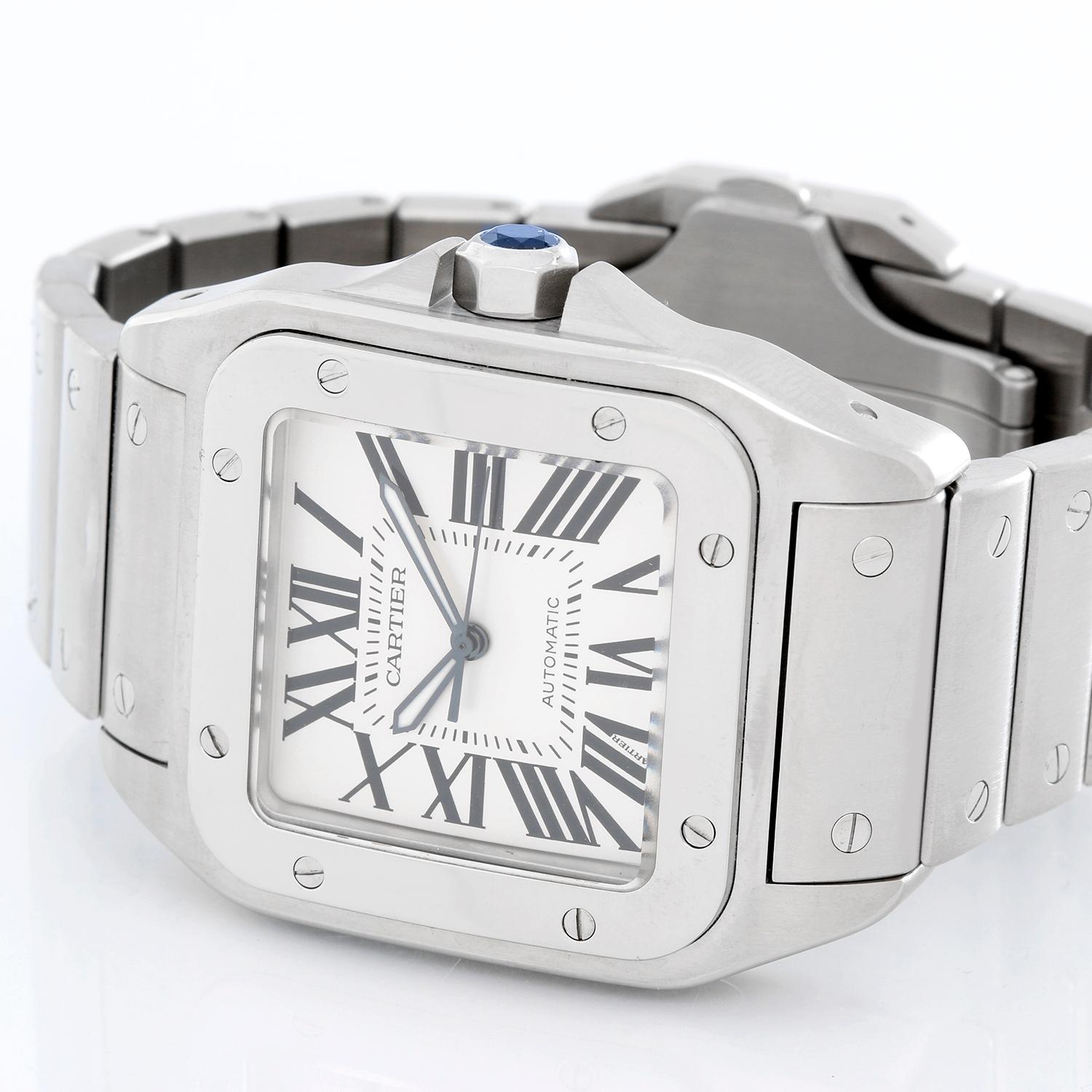 Cartier Santos 100 Steel Automatic Men's Watch W20073X8 - Automatic winding. Stainless steel case (38mm x 51mm). White dial with black Roman numerals. Stainless steel Cartier deployant style bracelet. Pre-owned with Cartier . 