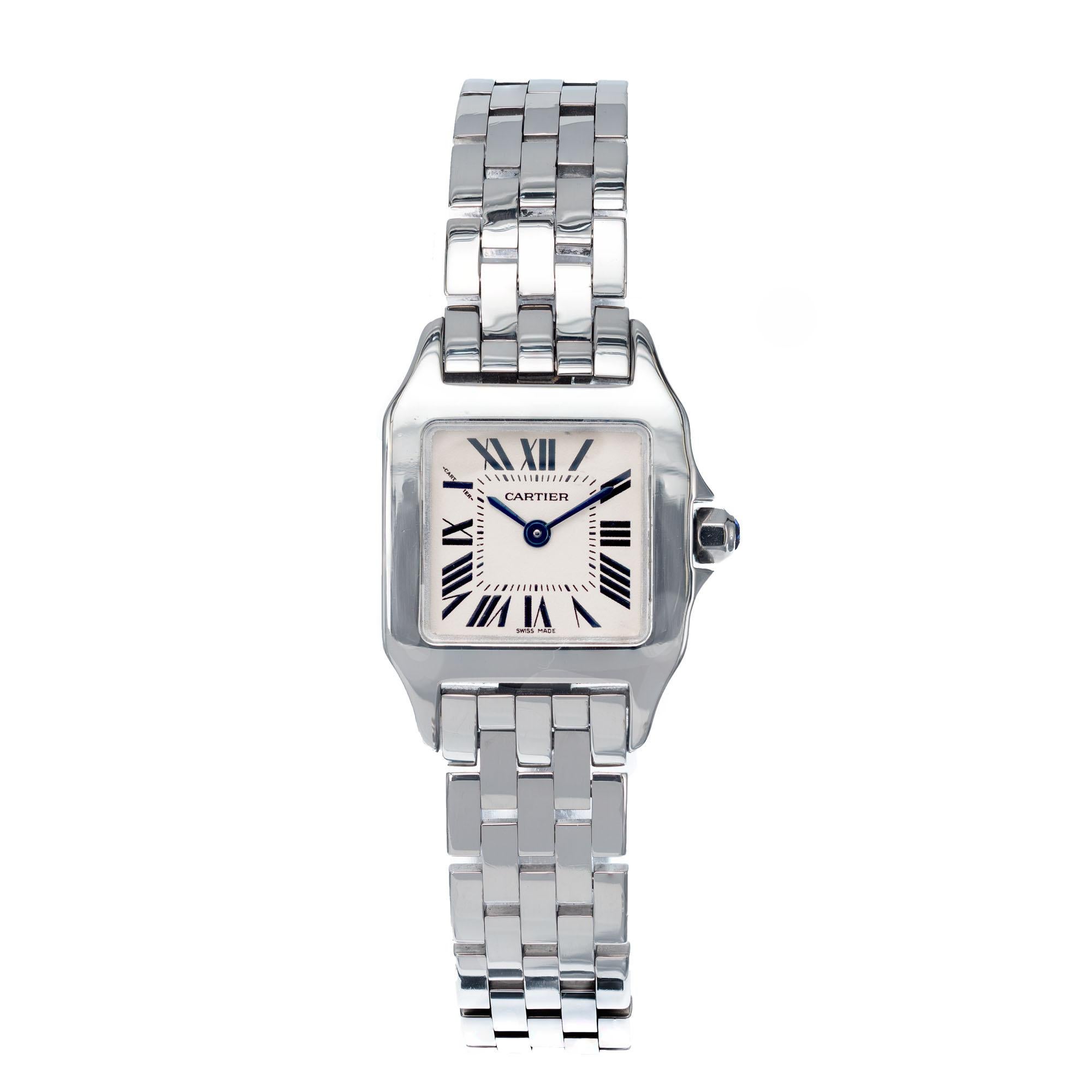 Small size Cartier vintage Demoiselle stainless steel wristwatch with quartz movement 

Length: 28.35mm
Width: 20.30mm
Band width at case: 12mm
Case thickness: 5.59mm
Band: Stainless steel panther
Crystal: sapphire
Dial: cream with Roman