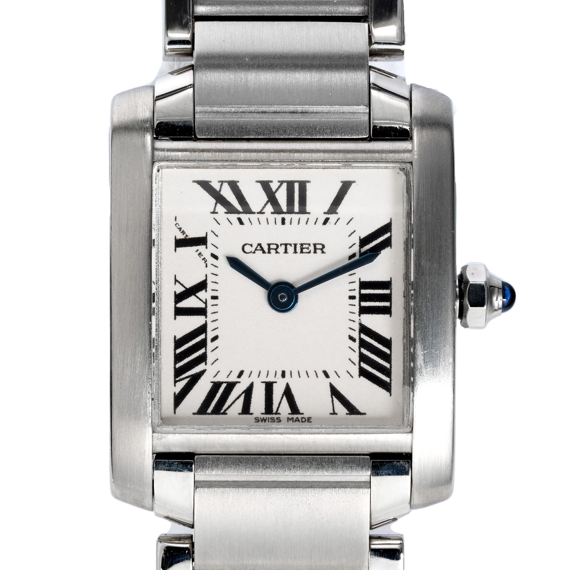 Classic Cartier steel Francaise tank Date wristwatch. White parchment rectangle dial with black Roman Numerals. Stainless steel. Blue steel hour hands. Cabochon sapphire on the crown.  Recently serviced and polished. Fully restored. 6.75 inches