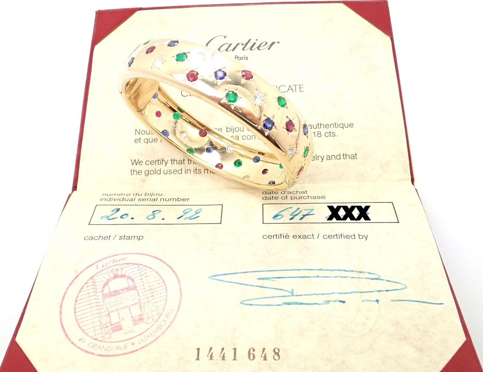 Brilliant Cut Cartier Star Diamond Ruby Emerald Sapphire Yellow Gold Bangle Bracelet For Sale