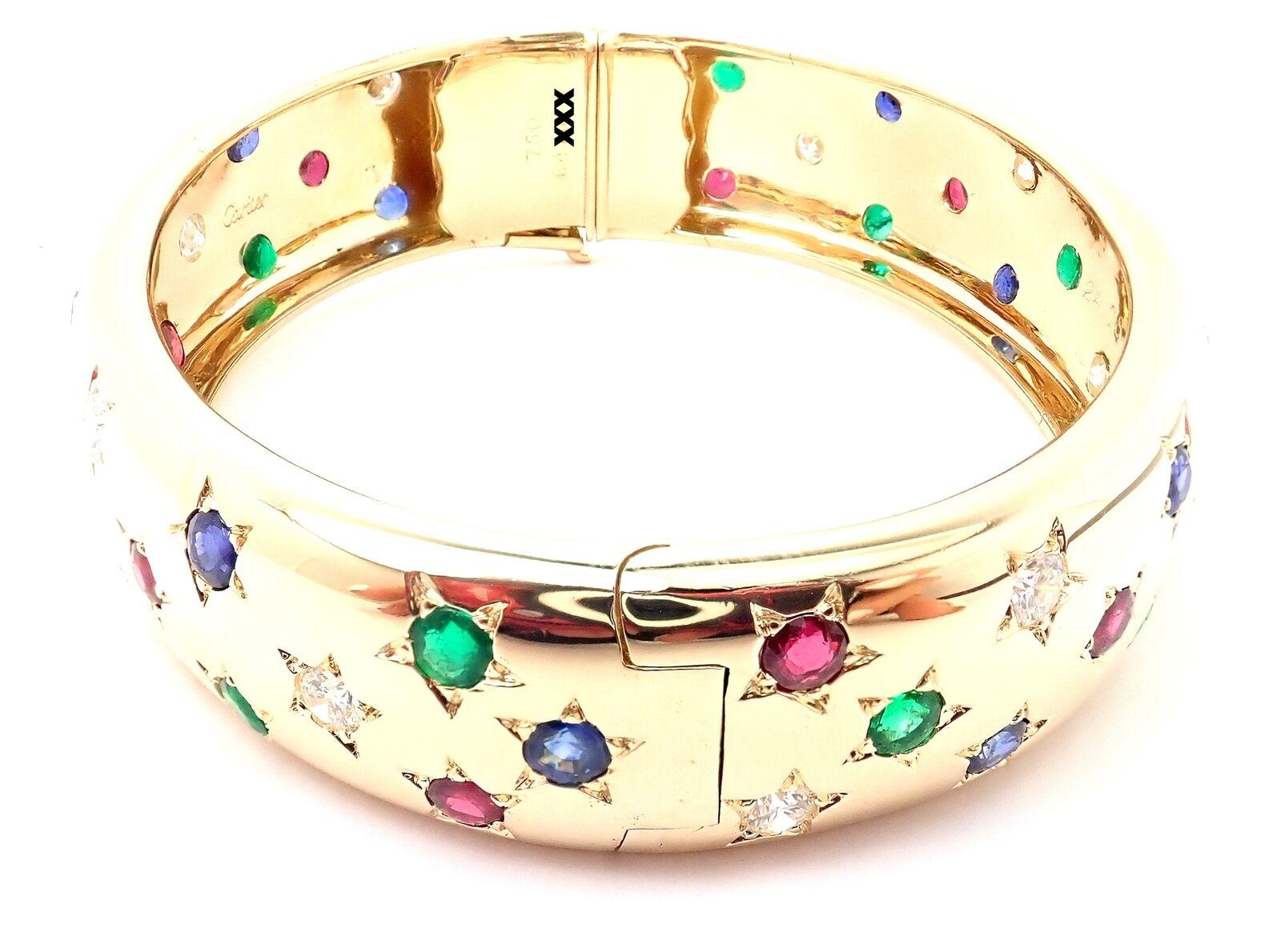 Cartier Star Diamond Ruby Emerald Sapphire Yellow Gold Bangle Bracelet In Excellent Condition For Sale In Holland, PA