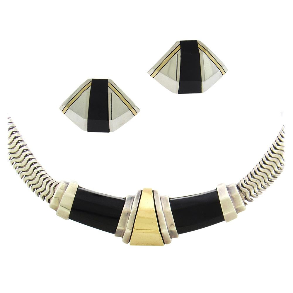 Vintage Cartier sterling silver, onyx and 18K gold Deco-inspired necklace and earrings, circa 1980. The necklace measures 17