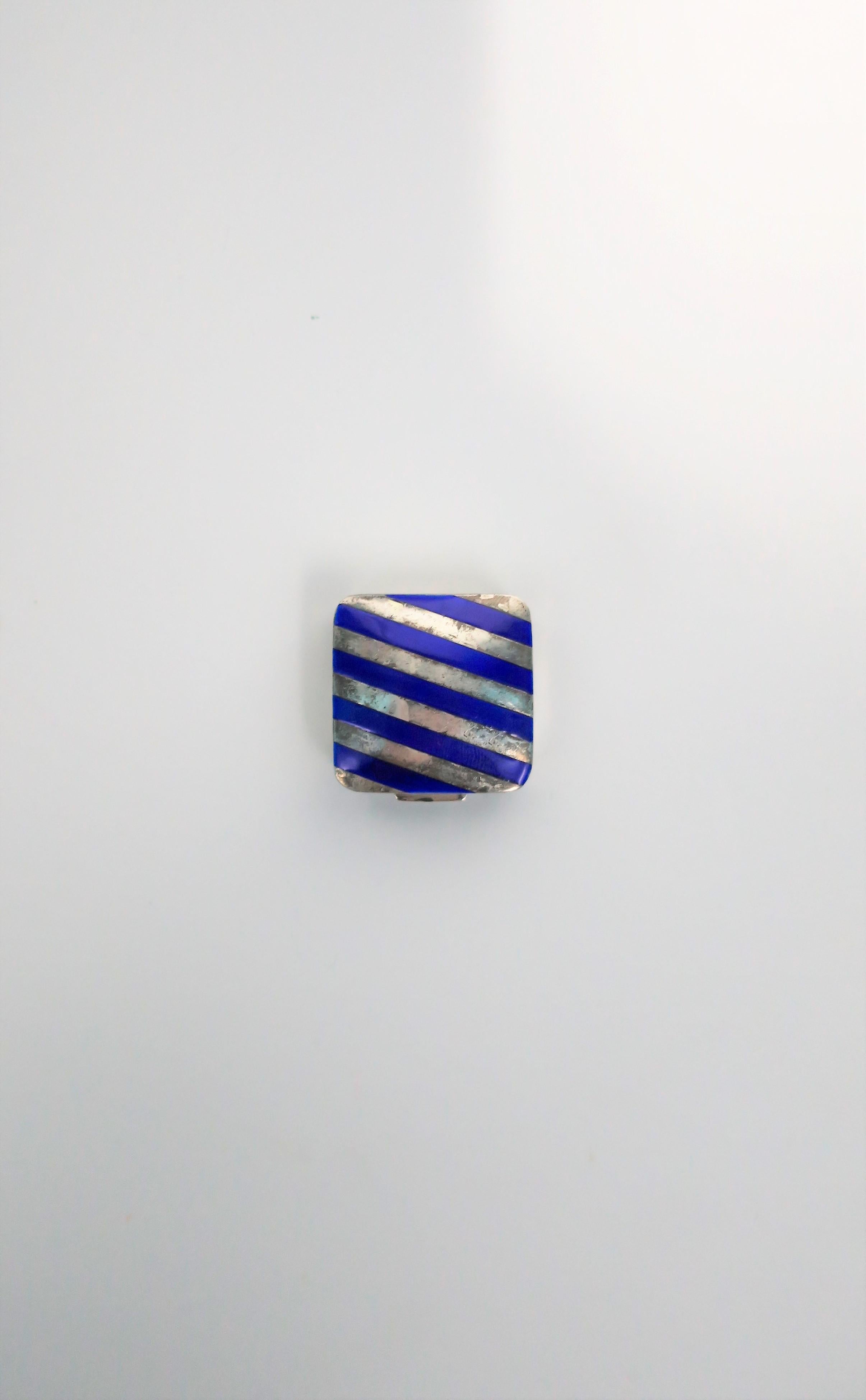 From French luxury maker Cartier, a very beautiful and rare sterling silver and cobalt blue enamel pill box, circa 20th century. Box has a nice weight to it. Piece is marked: 