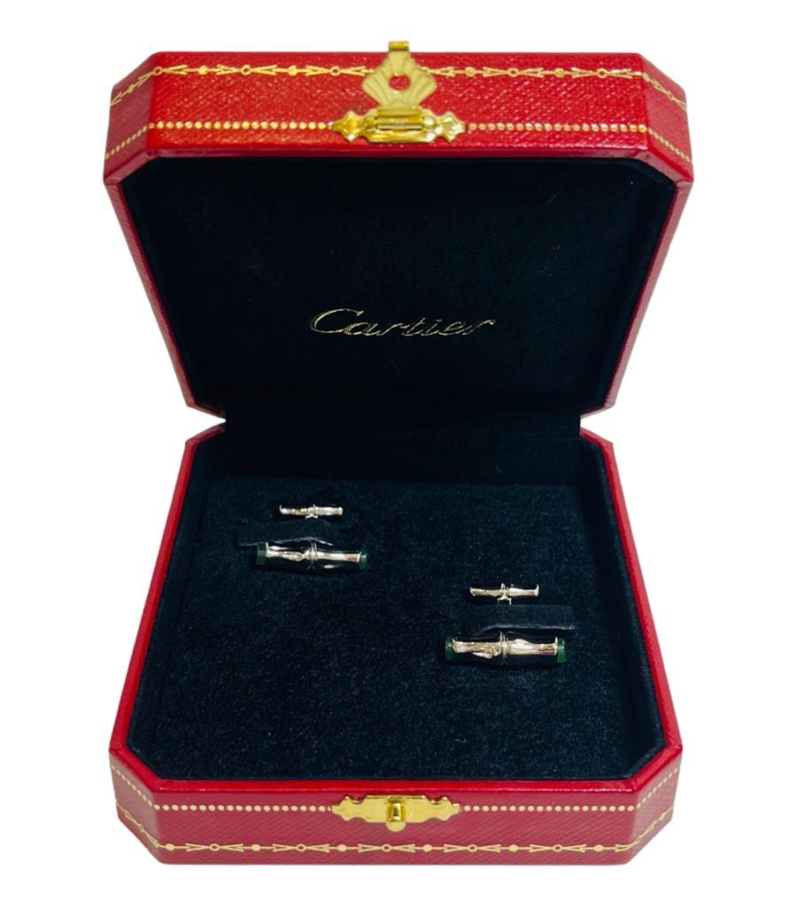 Cartier Sterling Silver Cufflinks With Emerald Stone Tips

Silver cufflinks designed with four terminal points with emerald green stone inlays on two of them.

Detailed with 'Cartier' engravement. 

Size – One Size 

Condition – Very