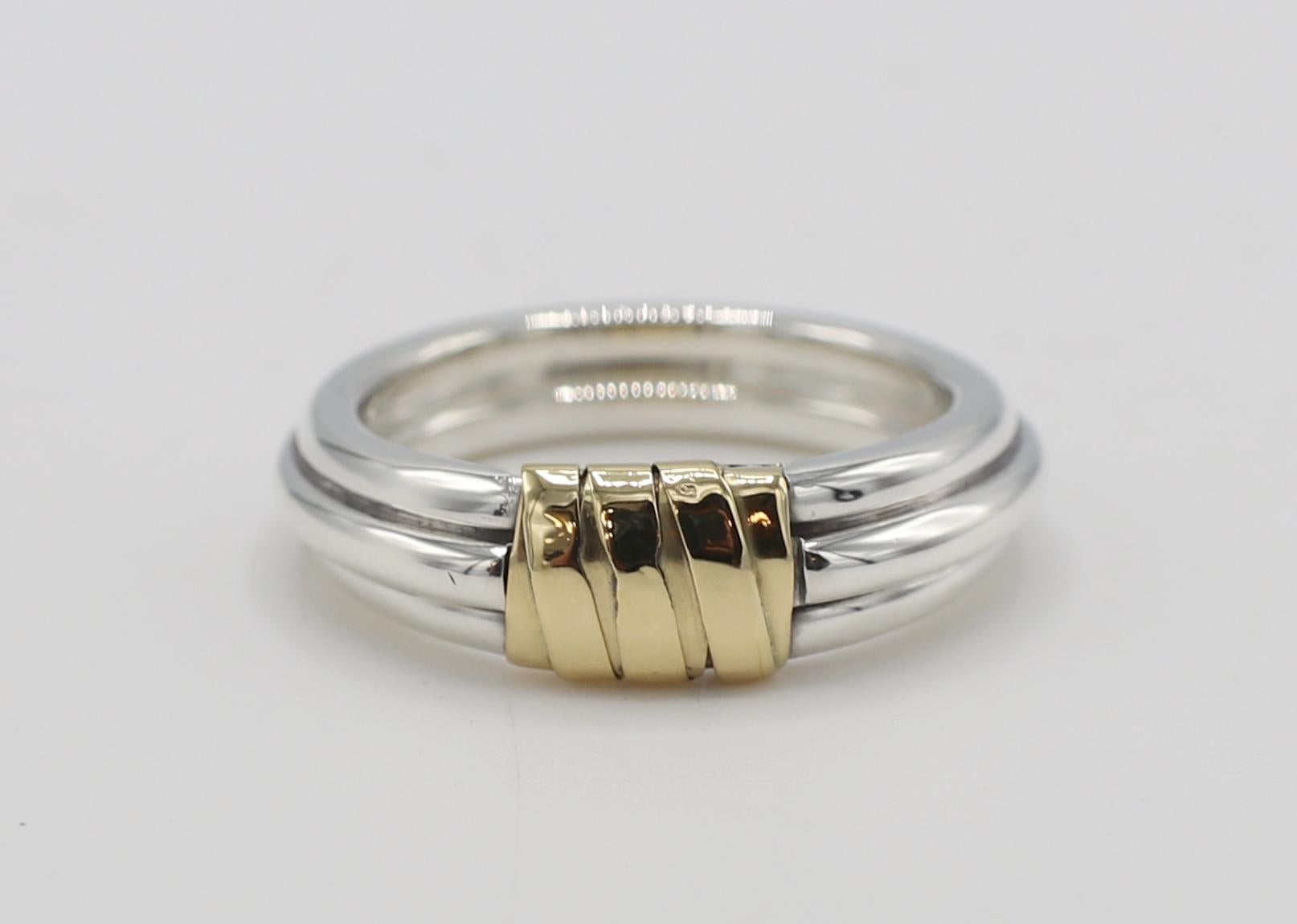 Cartier Sterling Silver & Gold Band Ring 
Metal: Sterling silver & 18k yellow gold
Weight: 4.49 grams
Size: 5.25 (US)
Width: 4-6mm
