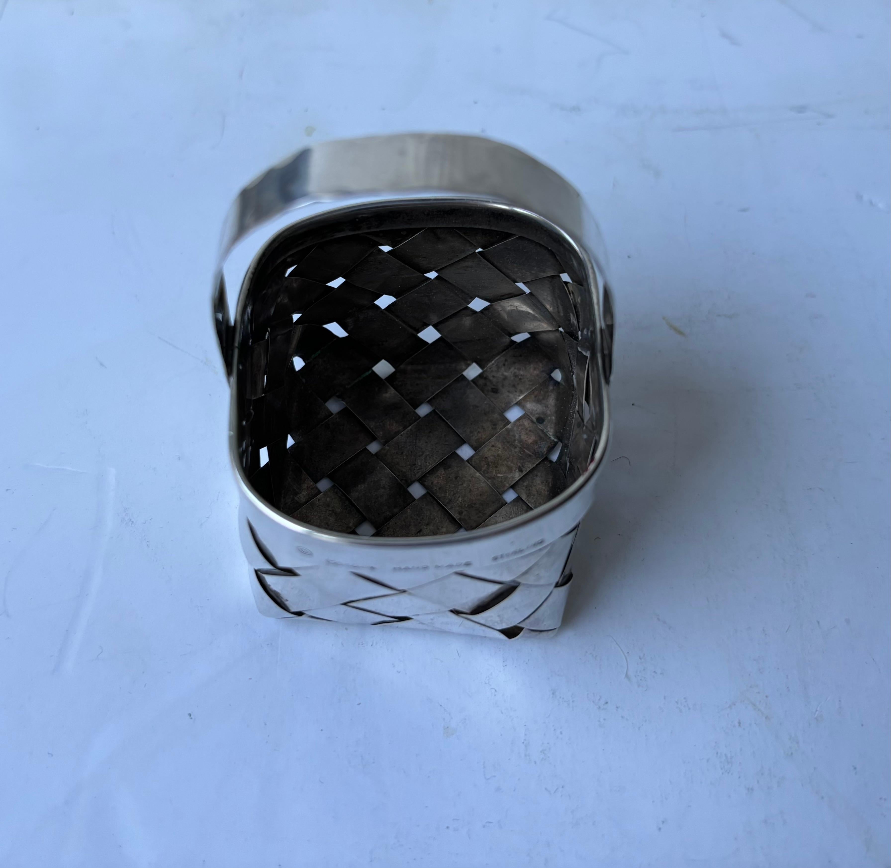 Modern Cartier sterling silver hand woven  basket .