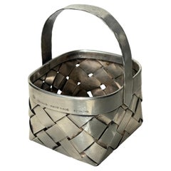 Cartier sterling silver hand woven  basket .